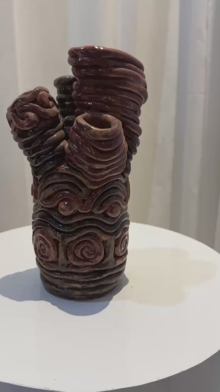 Organic modern handcrafted clay sculptural vase with four openings, rich layered glaze and dynamic form ideal for artistic interiors — Hommes and Gardens, Vases + Vessels Collection, Landscape Architect, Interior Designer, Outdoor Living, Art, Furniture, Objects, Best Gifts, Nature, Backyard, Yard, Outdoor Decorations, Home Decor, Home Design, Luxury Design.