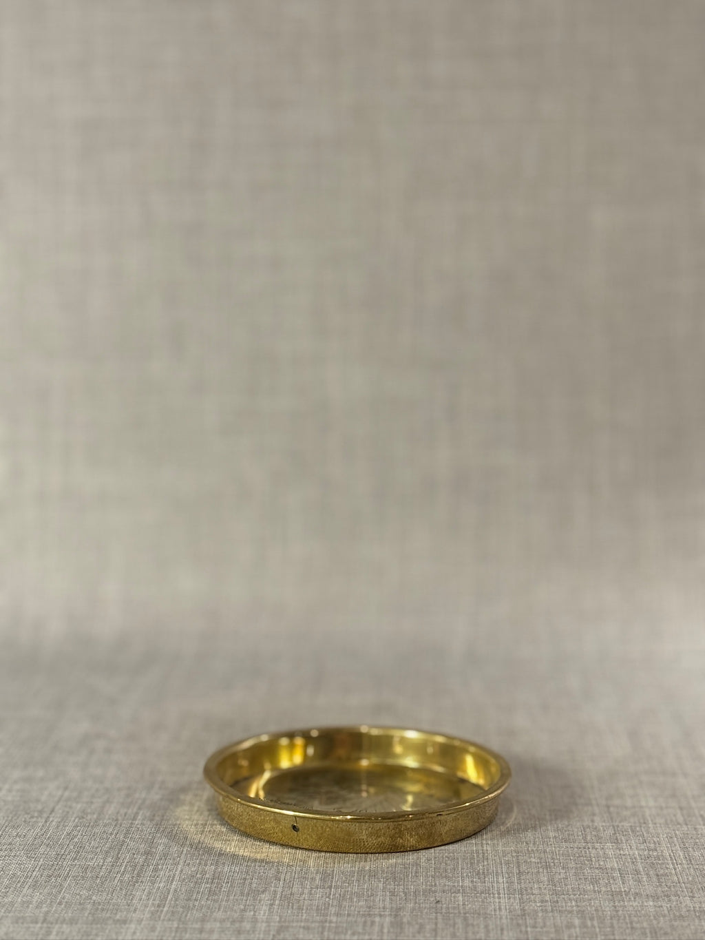 small brass trinket dish with traditional design