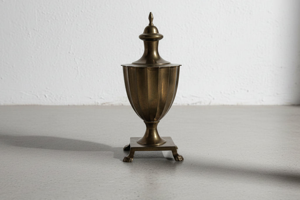Monumental Antique Brass Lidded Urn with Fluted Body, Turned Finial and Sculptural Paw Feet on Square Plinth Base
