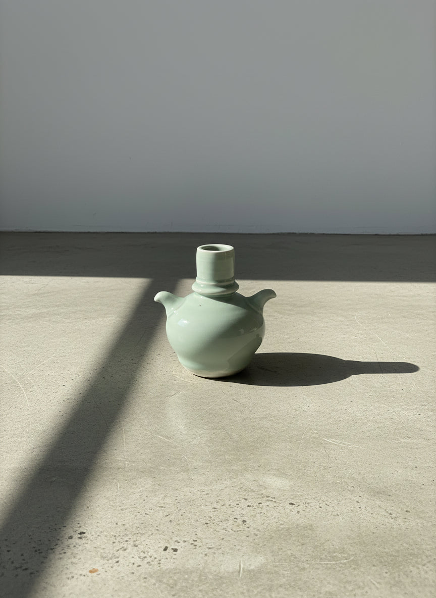 Elegant Pale Blue Studio Pottery Vase with Dual Sculpted Handles – Handcrafted Ceramic Art