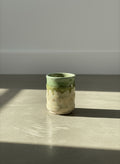 hand thrown studio pottery tumbler with green drip glaze
