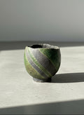 handcrafted wabi sabi chawan tea bowl with green and charcoal glaze