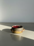 handmade studio pottery bowl with handles plum glaze interior