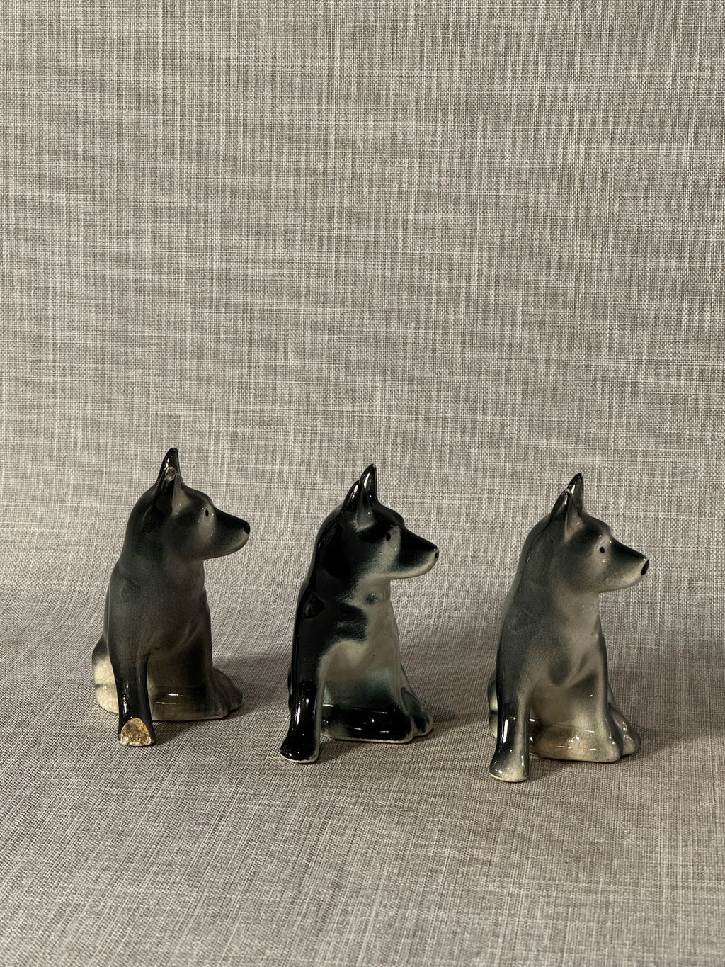 Set of 3 Vintage Black & Cream Ceramic Sitting Dog Figurines – Glossy Glazed Collectible Trio