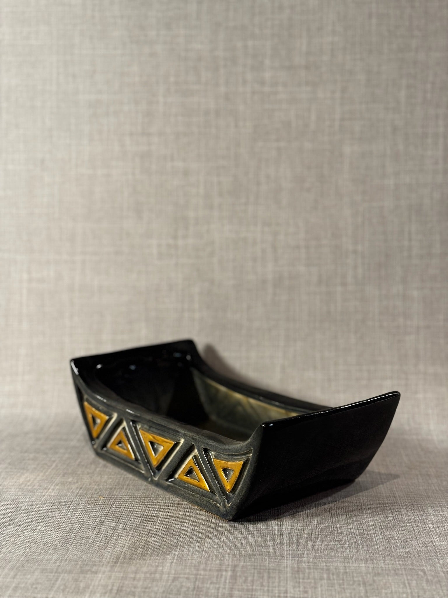 Mid-Century Black Ceramic Canoe Planter with Raised Mustard Geometric Triangles