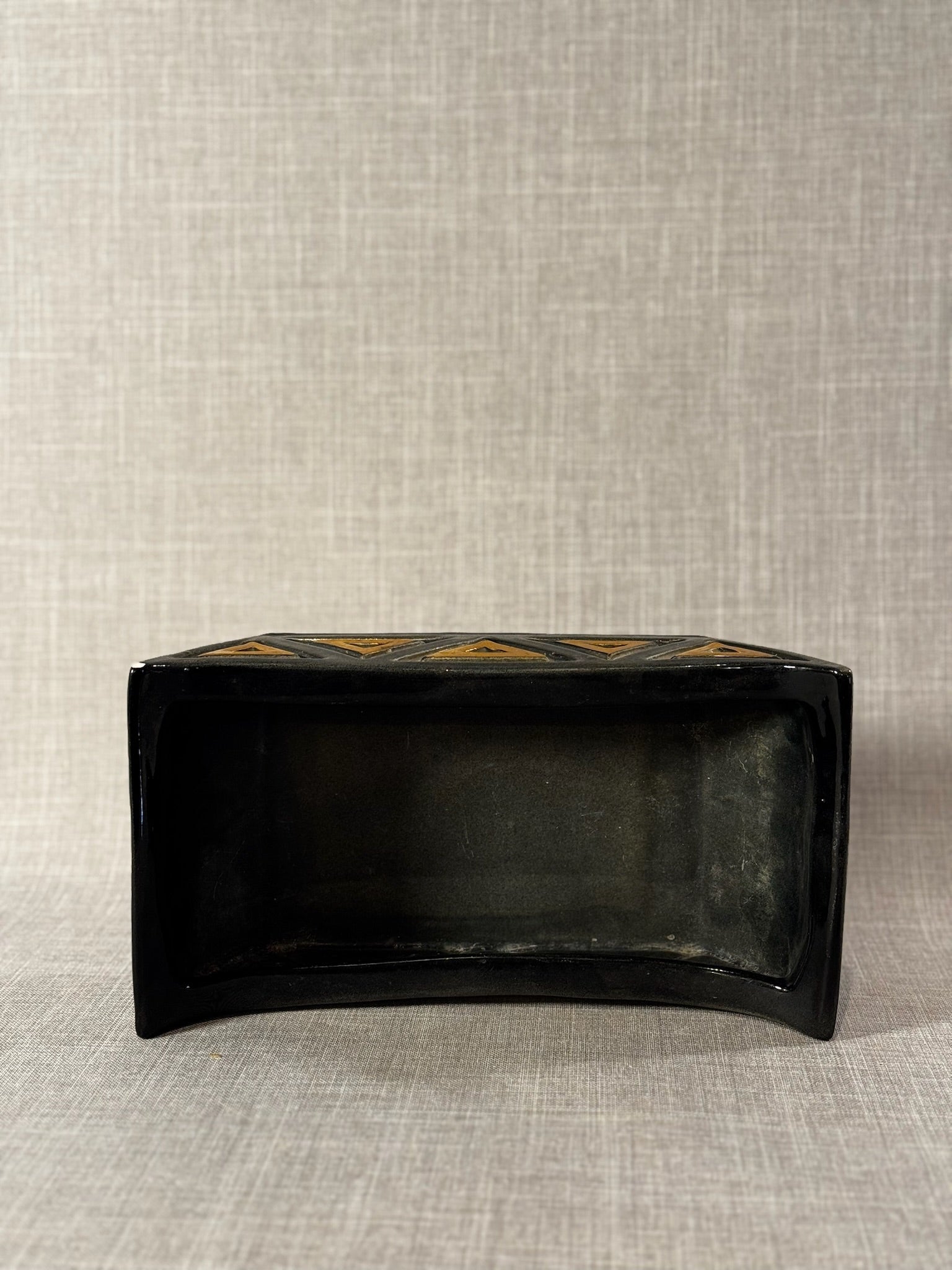 Mid-Century Black Ceramic Canoe Planter with Raised Mustard Geometric Triangles