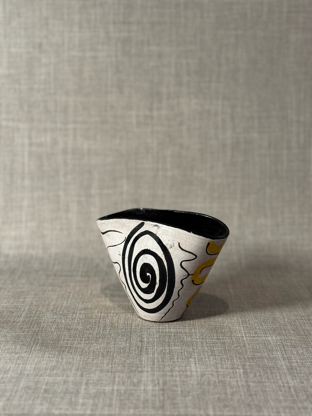 handmade studio pottery cone bowl with abstract spiral artwork