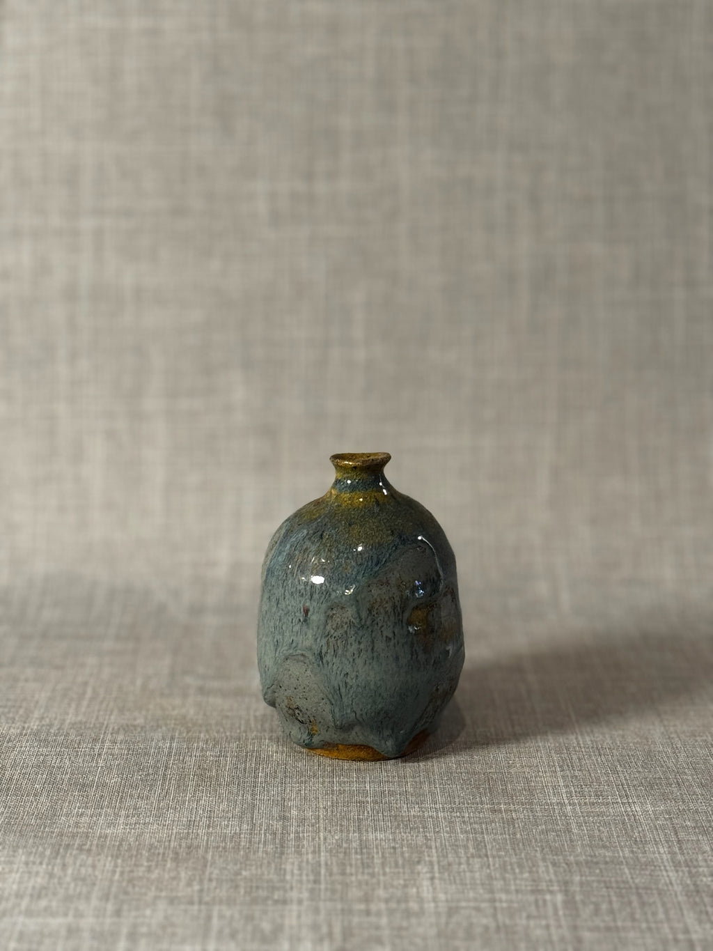 Handmade Studio Pottery Bud Vase with Flowing Blue-Green Lava Glaze & Ochre Accents