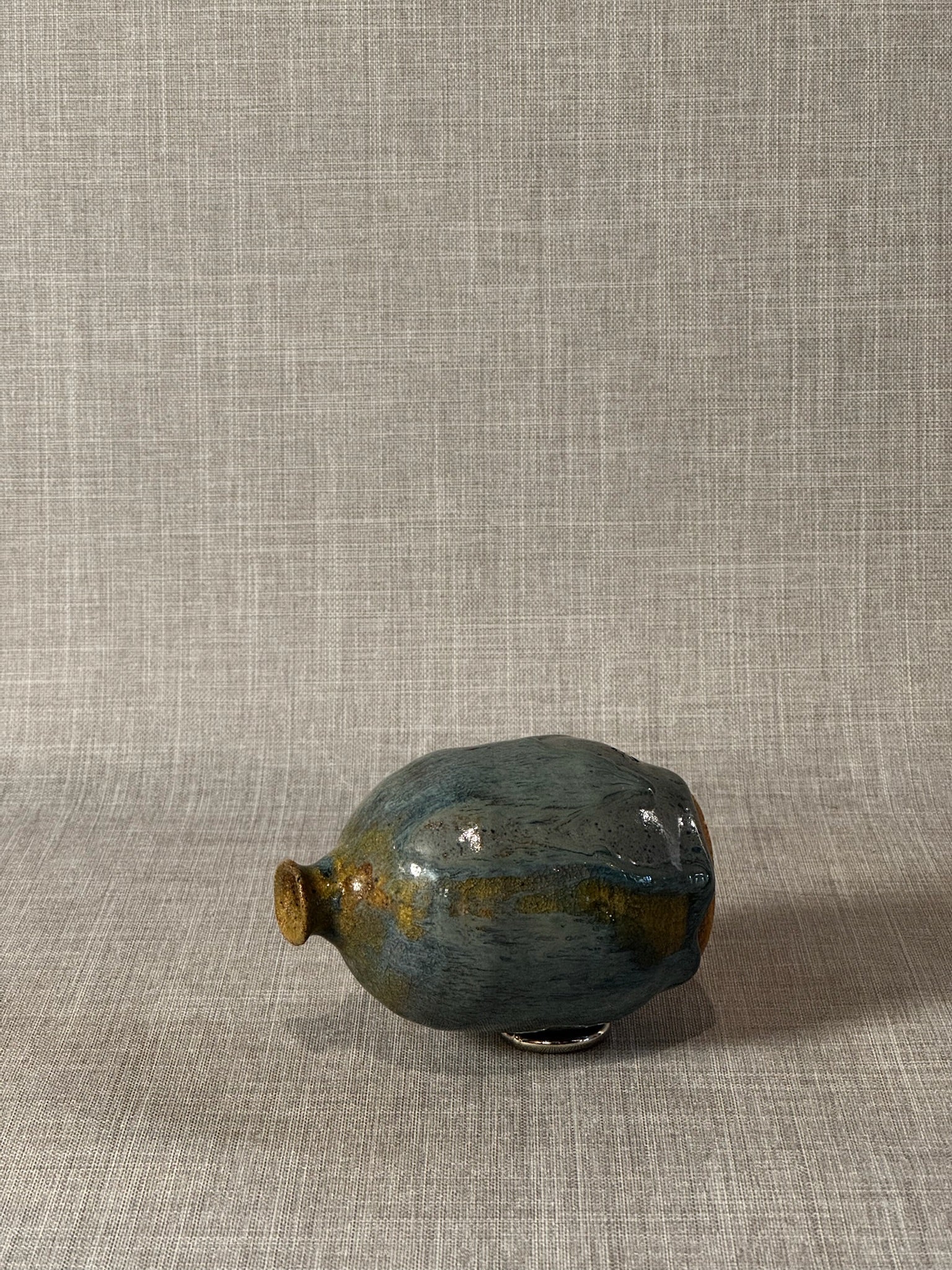Handmade Studio Pottery Bud Vase with Flowing Blue-Green Lava Glaze & Ochre Accents