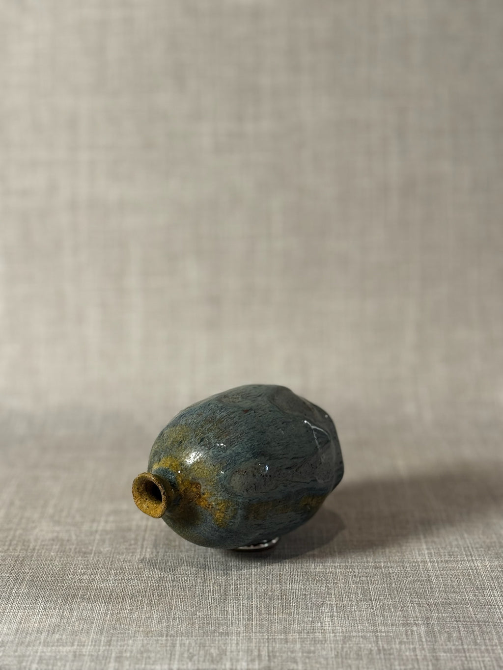 Handmade Studio Pottery Bud Vase with Flowing Blue-Green Lava Glaze & Ochre Accents