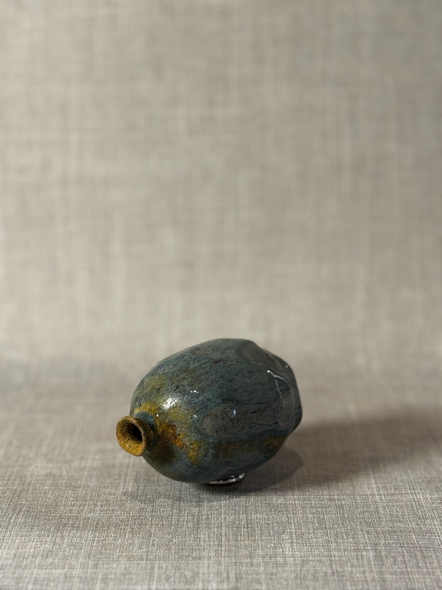 Handmade Studio Pottery Bud Vase with Flowing Blue-Green Lava Glaze & Ochre Accents