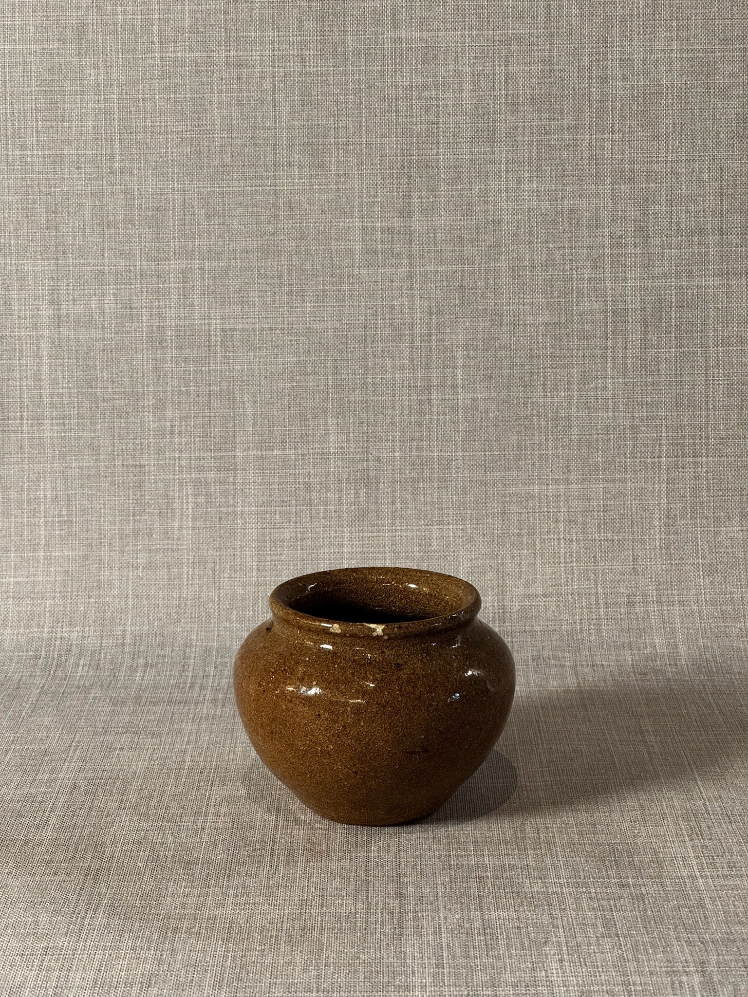 Rustic Handcrafted Brown Glazed Stoneware Jar with White Floral Brushwork
