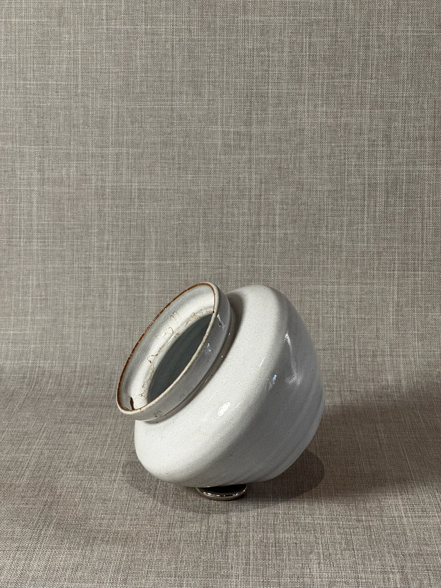 Elegant Handcrafted White Stoneware Vessel with Warm Rustic Rim Accents