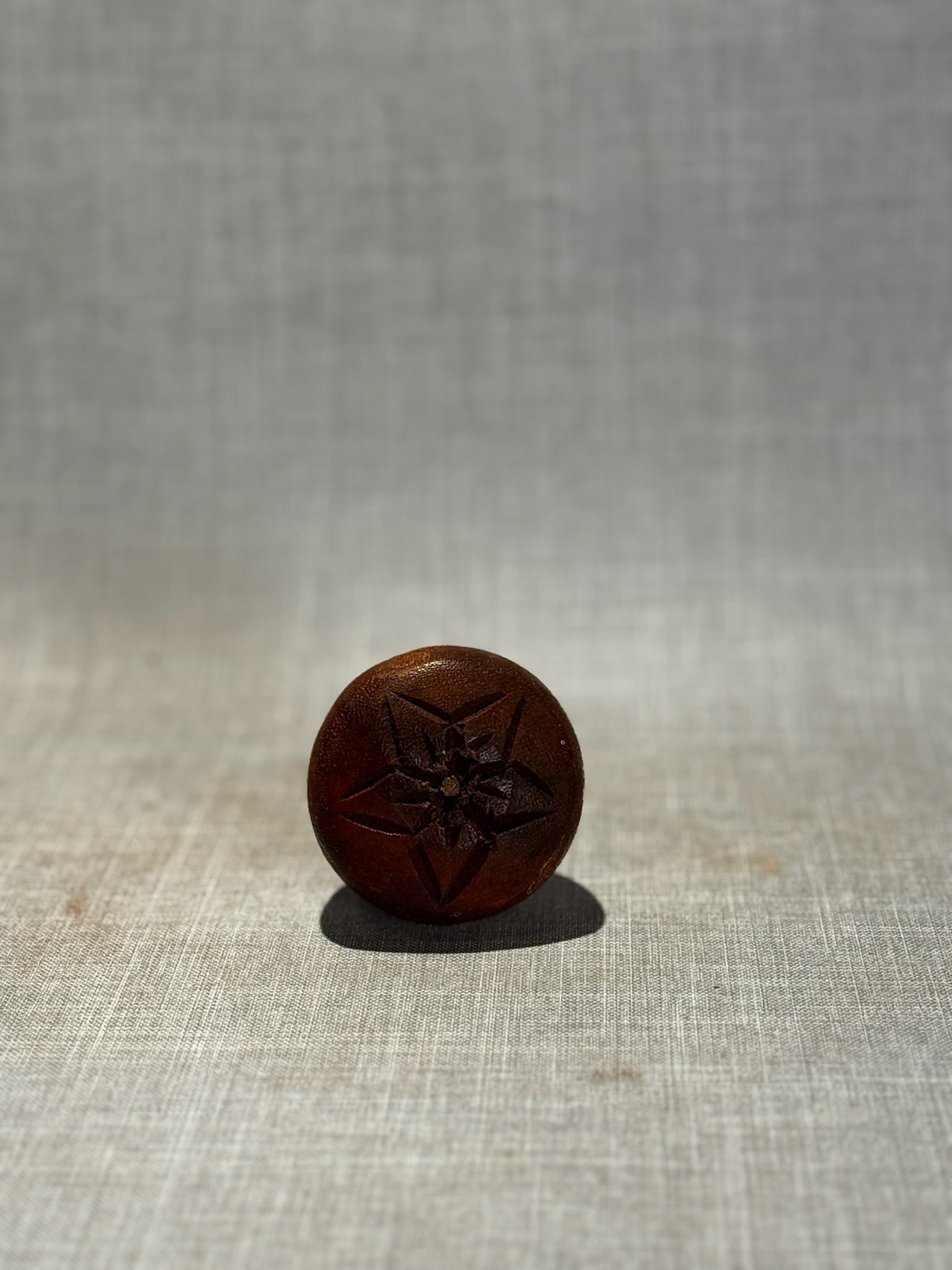 Vintage Hand-Carved Wooden Strawberry Figurine with Starburst Leaf Detail