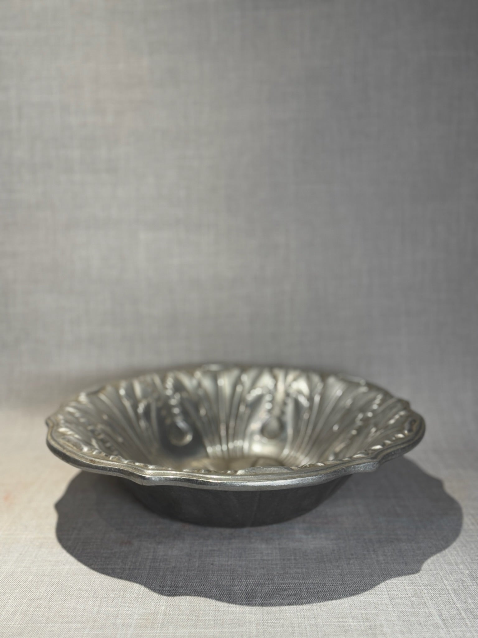 Vintage Embossed Pewter Floral Centerpiece Bowl – Heavy Pressed Metal Decorative Dish with Scalloped Rim
