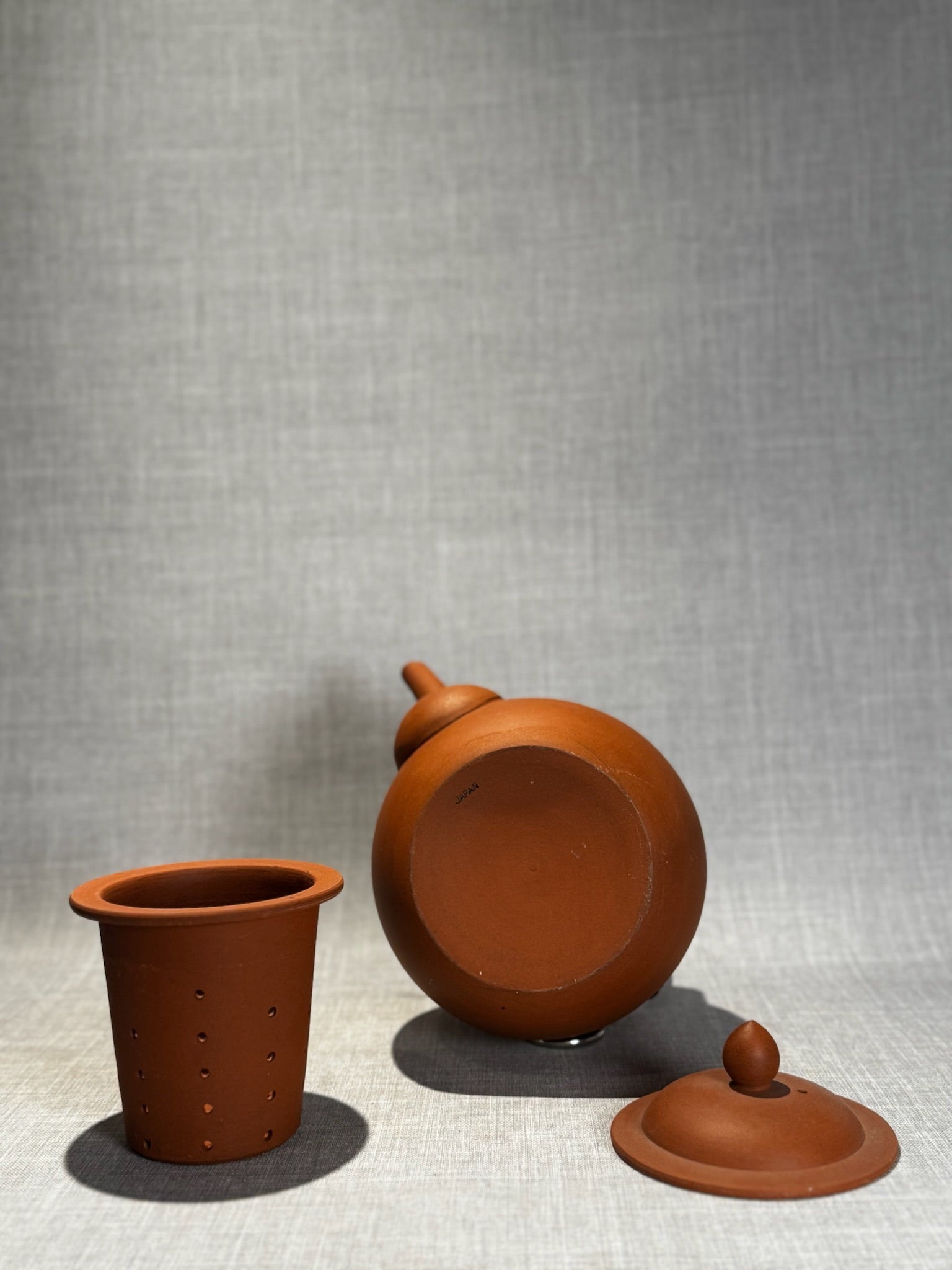 Vintage Japanese Unglazed Terracotta Teapot with Bamboo Handle and Removable Tea Strainer