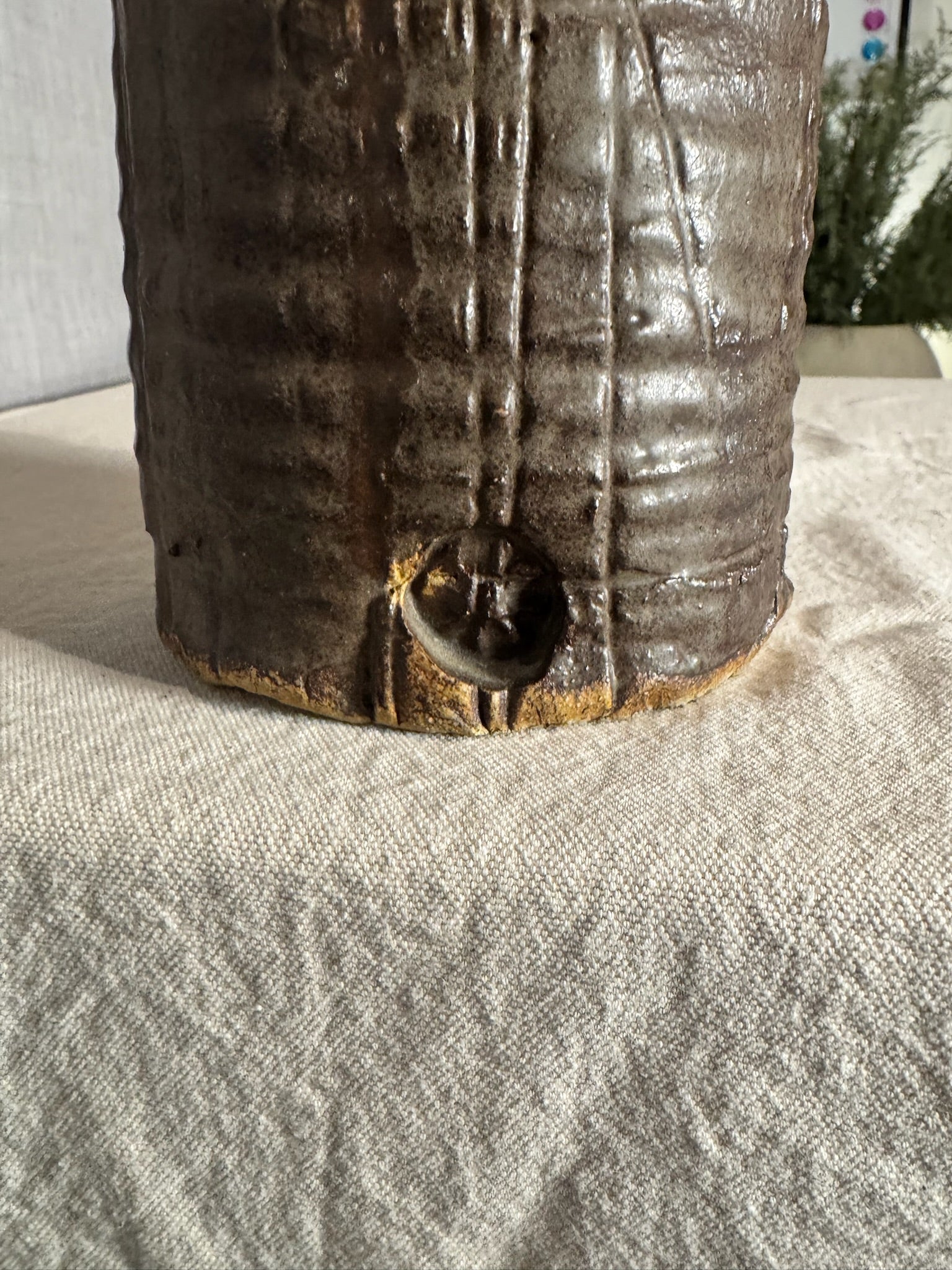 Antique Hand-Built Stoneware Sculptural Vessel with Armor-Like Relief, Earth-Tone Ash Glaze