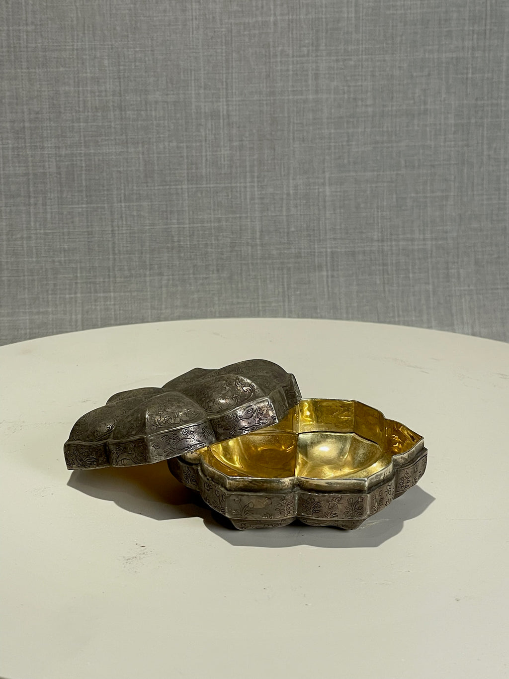 decorative vintage jewelry box with gilded interior