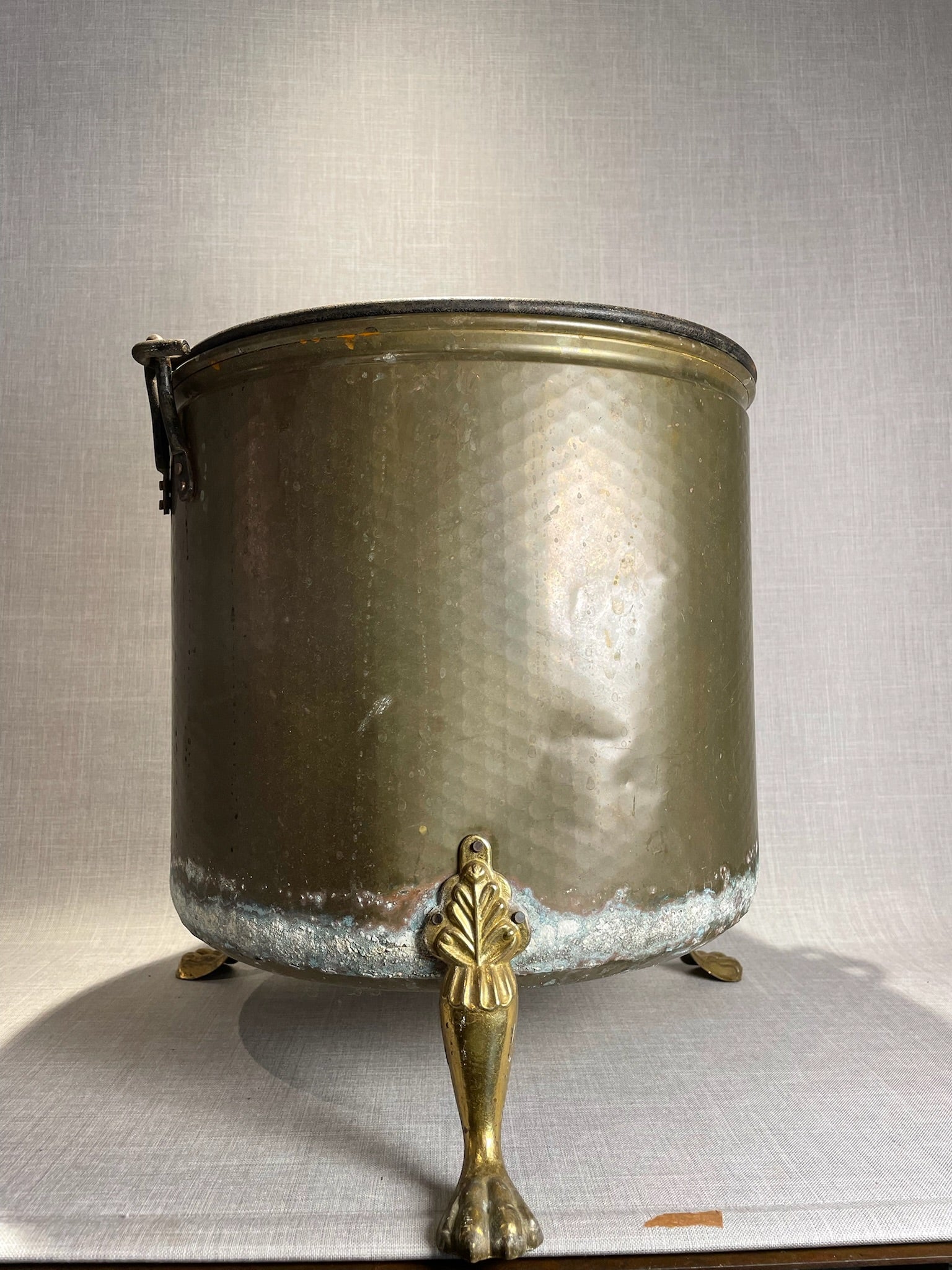 Large Antique English Hand-Hammered Brass Bucket with Claw Feet and Iron Handle