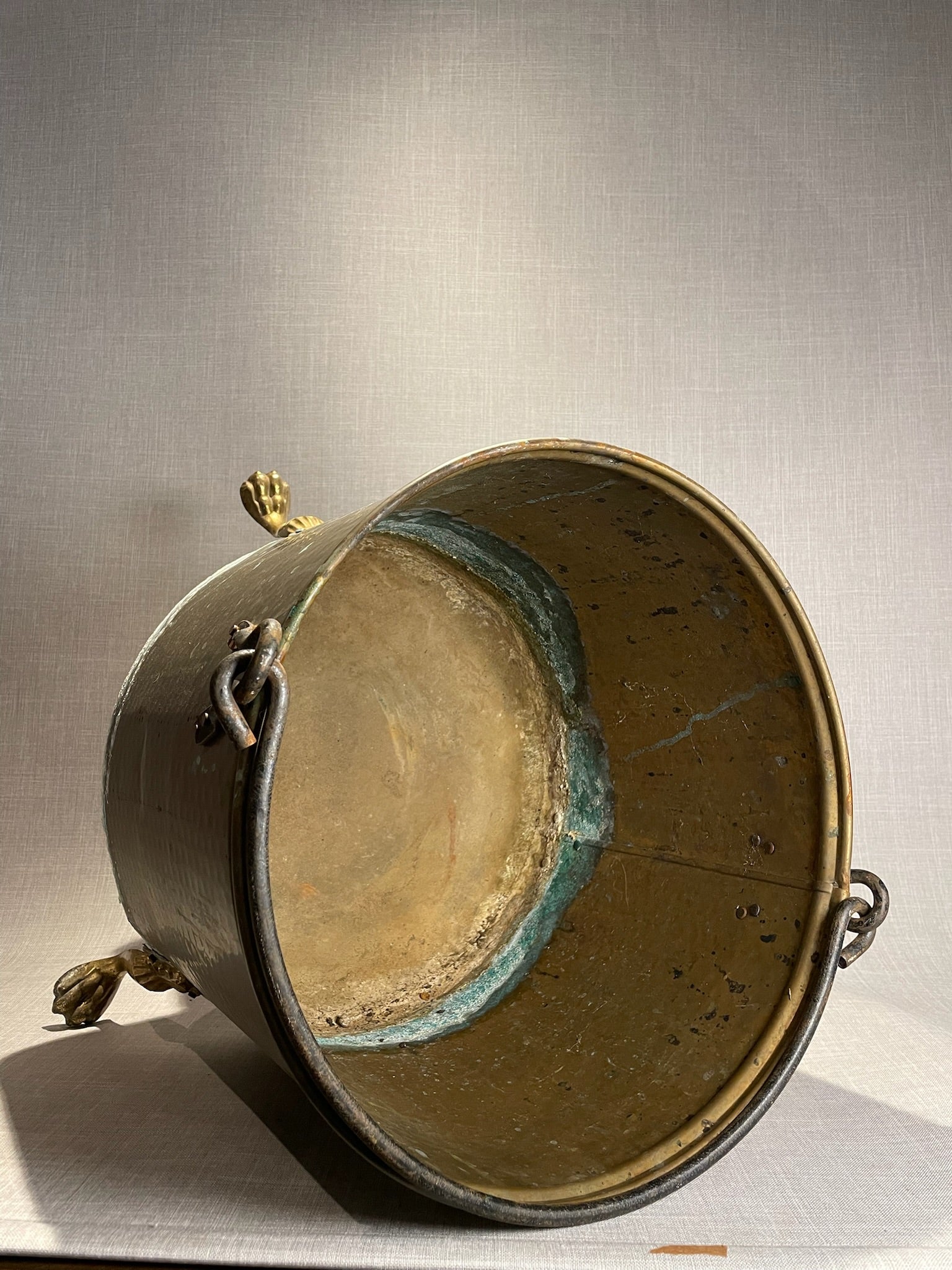 Large Antique English Hand-Hammered Brass Bucket with Claw Feet and Iron Handle