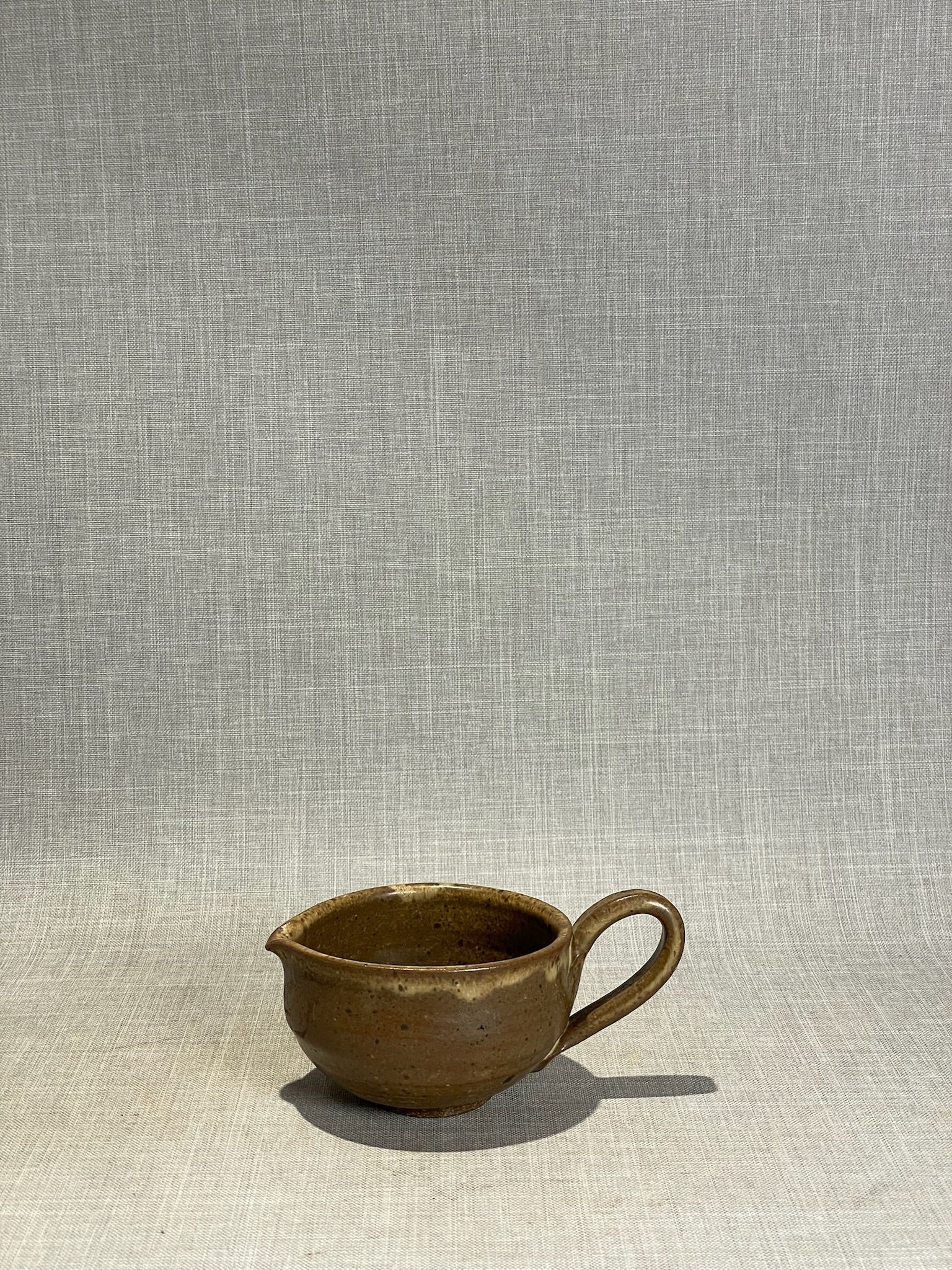 Rustic Hand-Thrown Stoneware Creamer – Artisan Brown Glazed Studio Pottery Pitcher with Handle & Spout