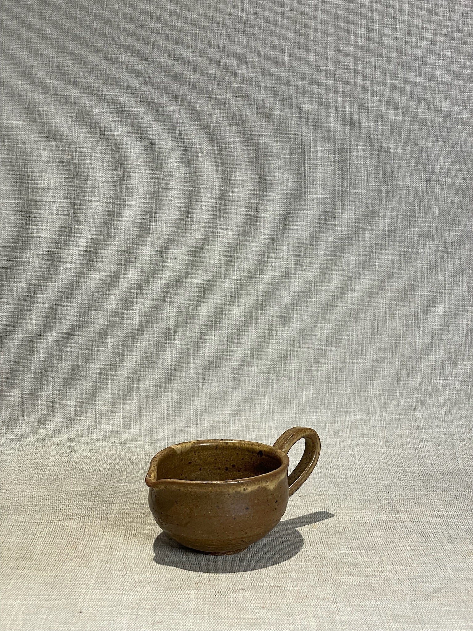Rustic Hand-Thrown Stoneware Creamer – Artisan Brown Glazed Studio Pottery Pitcher with Handle & Spout