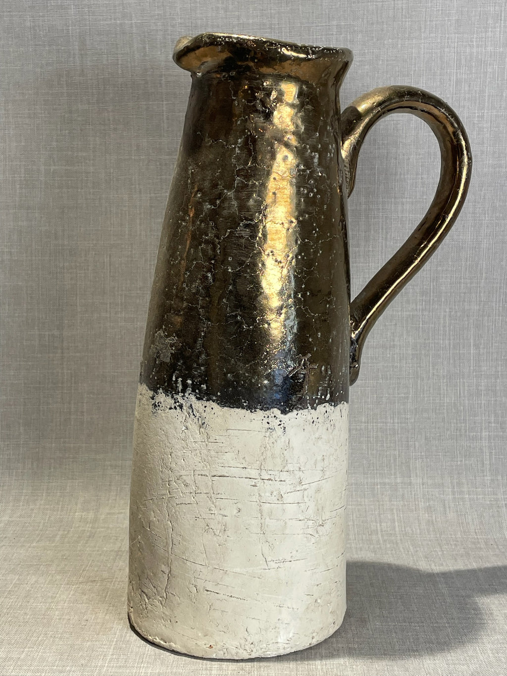 rustic handmade terracotta vase with gold finish detail