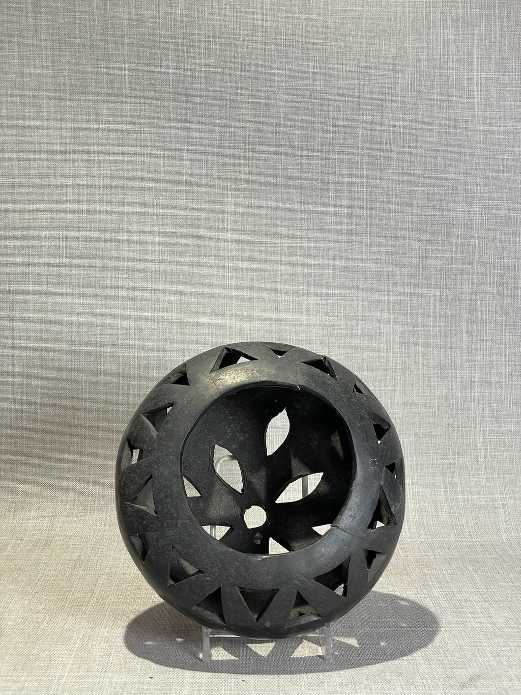 black ceramic cutout bowl with geometric design