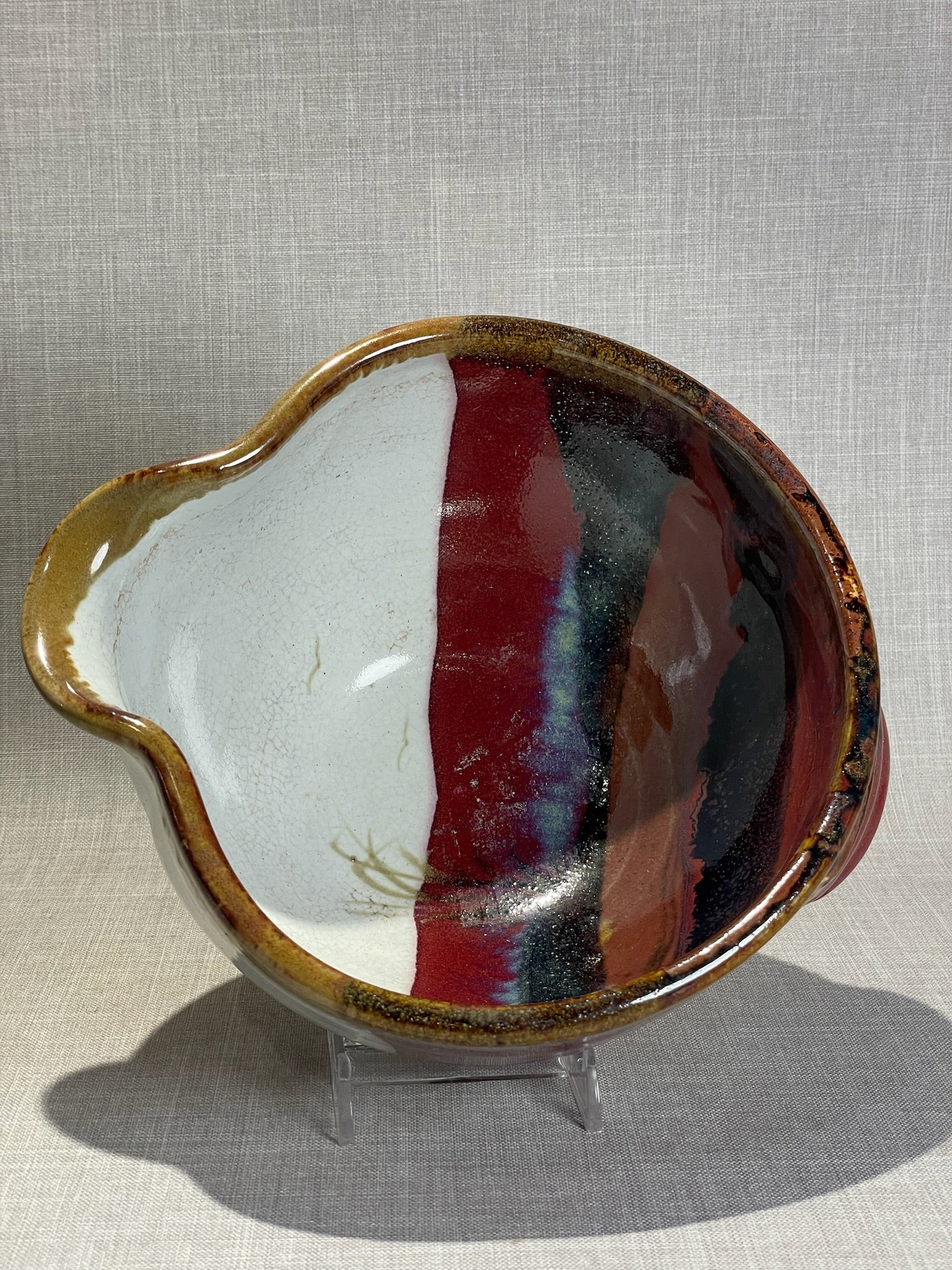 Signed Studio Art Pottery Pitcher with Red and White Glaze and Applied Handle