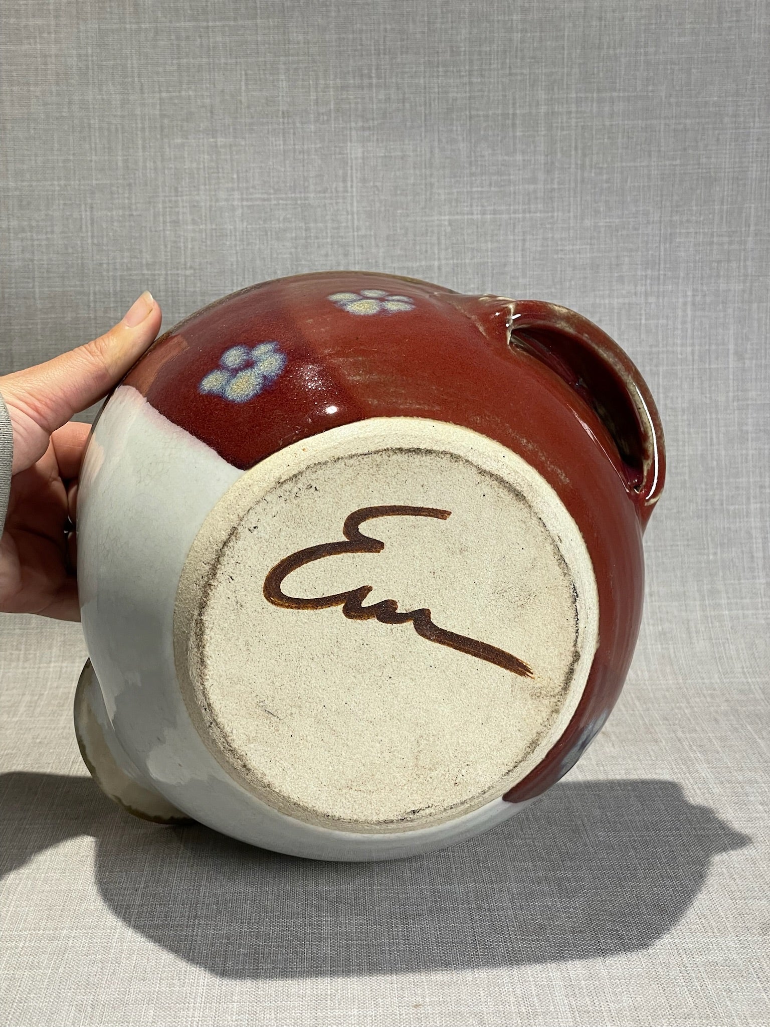 Signed Studio Art Pottery Pitcher with Red and White Glaze and Applied Handle