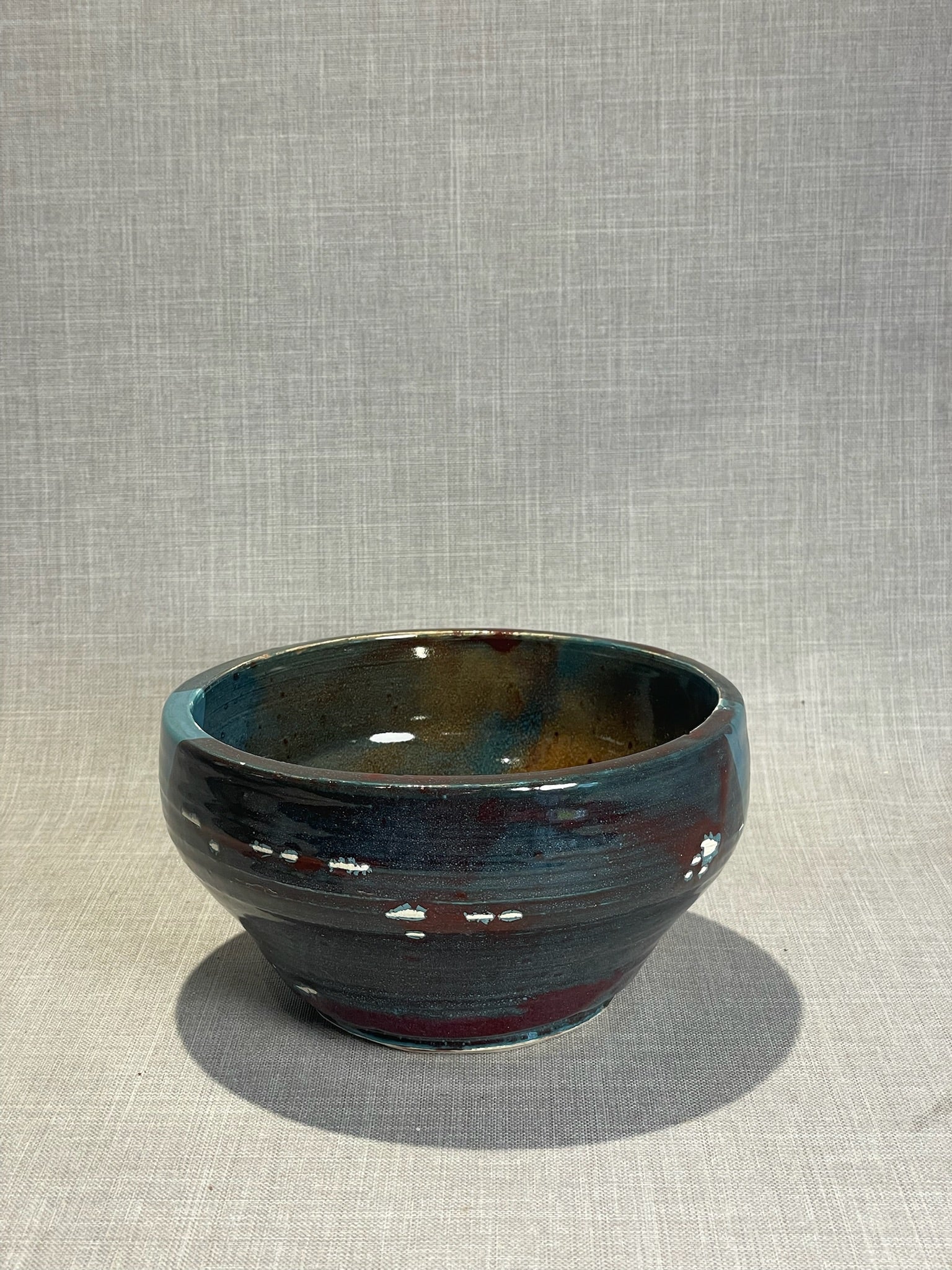 Artisan Wheel-Thrown Stoneware Bowl with Deep Teal, Rust & Earth-Tone Layered Glaze