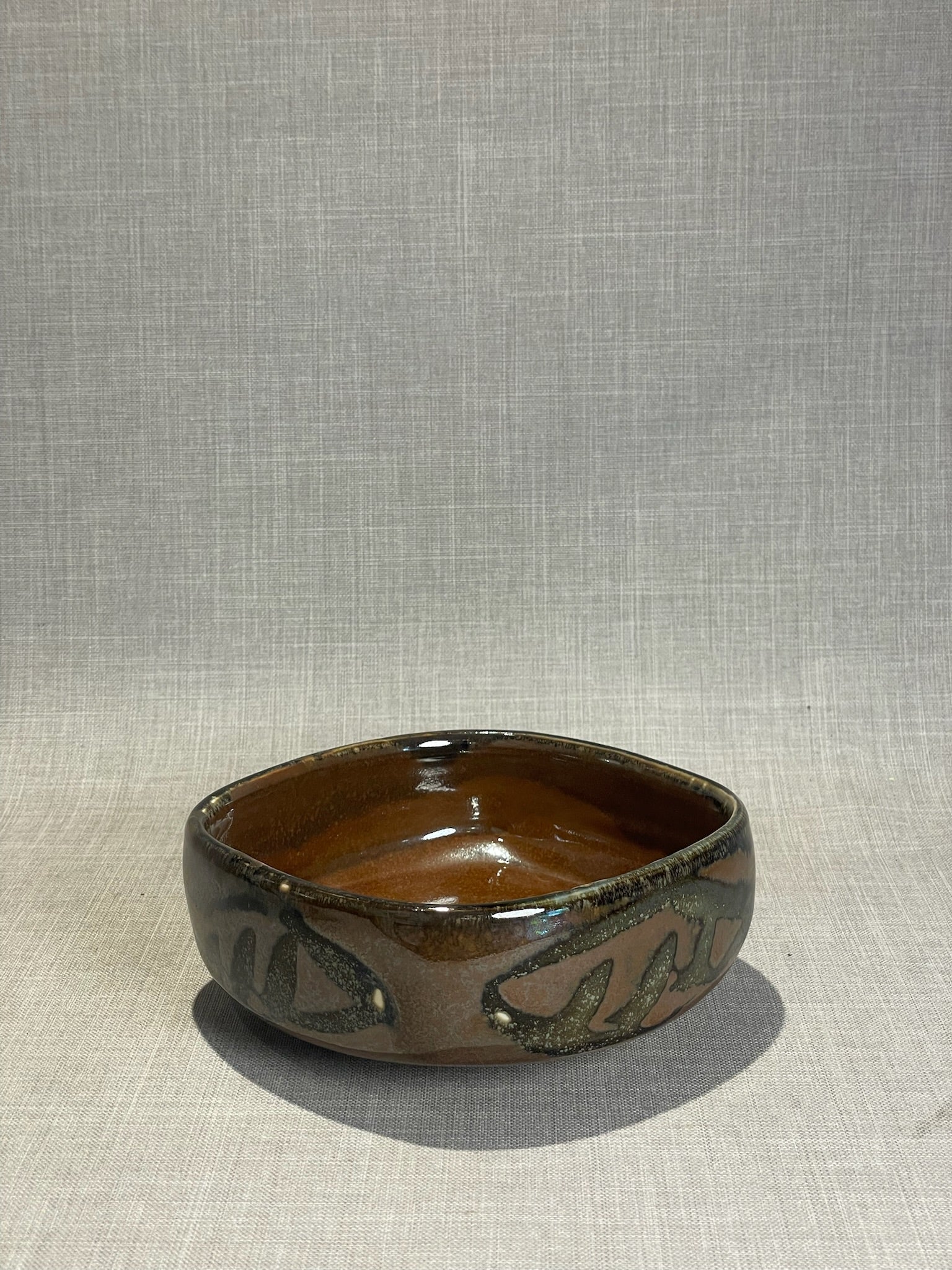 Handcrafted Brown Drip-Glazed Studio Pottery Bowl with Organic Abstract Motifs