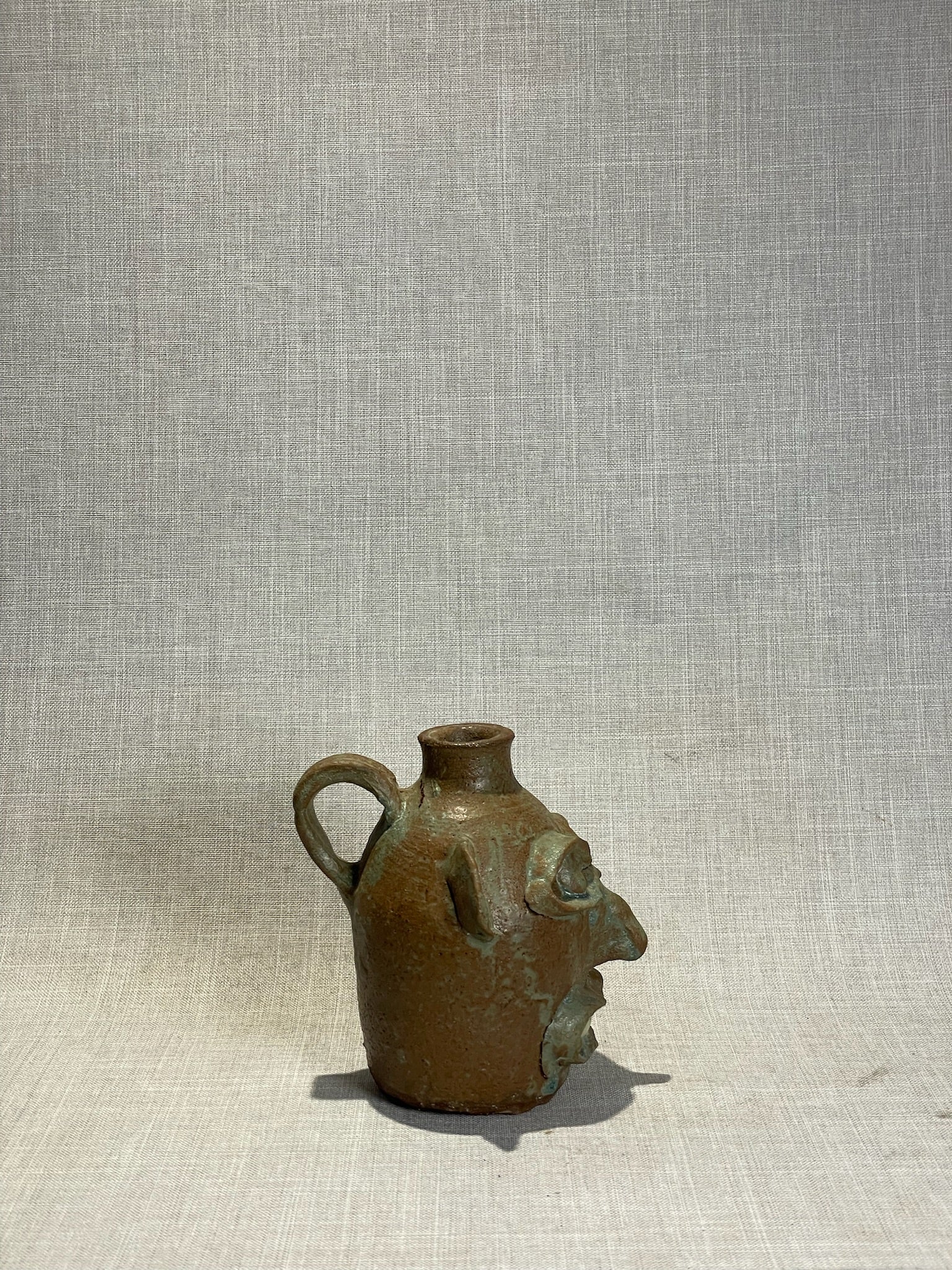 Handcrafted Studio Art Pottery Face Jug with Expressive Features and Brown Glaze
