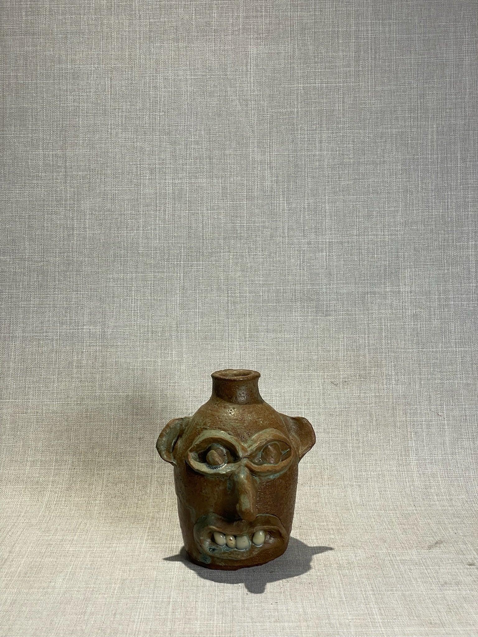 Handcrafted Studio Art Pottery Face Jug with Expressive Features and Brown Glaze