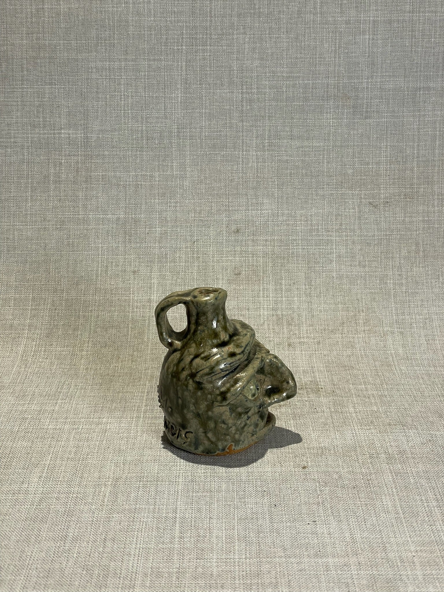 Signed Studio Art Pottery Face Jug “April Flowers” with Expressive Sculpted Features and Olive Drip Glaze