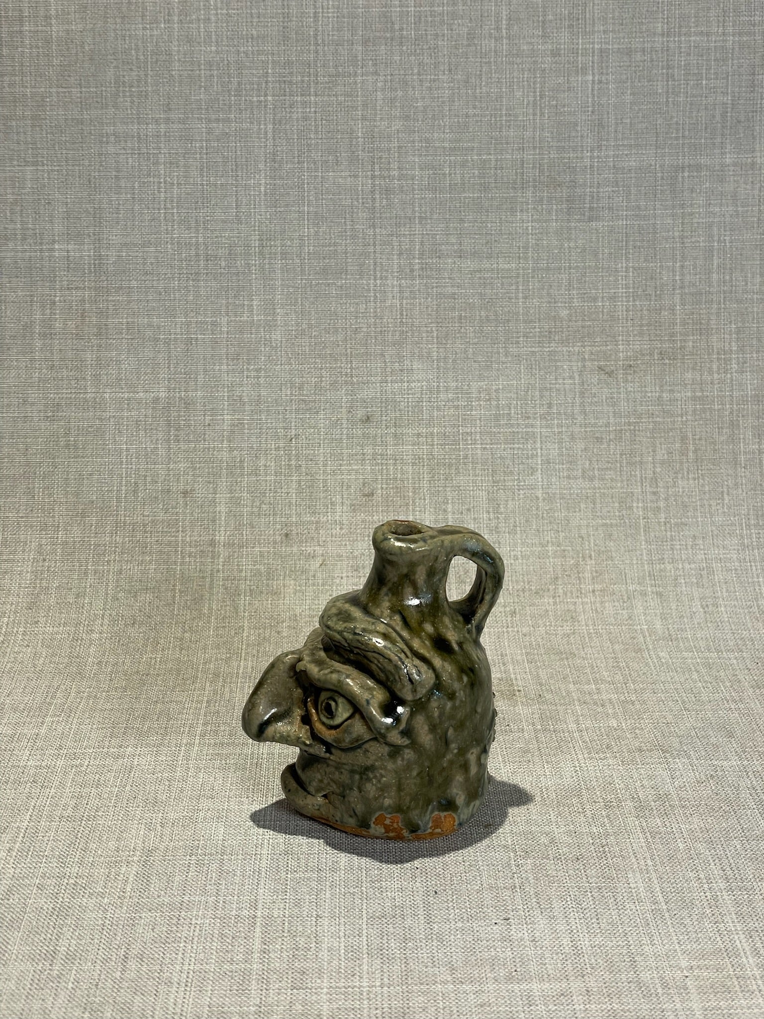 Signed Studio Art Pottery Face Jug “April Flowers” with Expressive Sculpted Features and Olive Drip Glaze