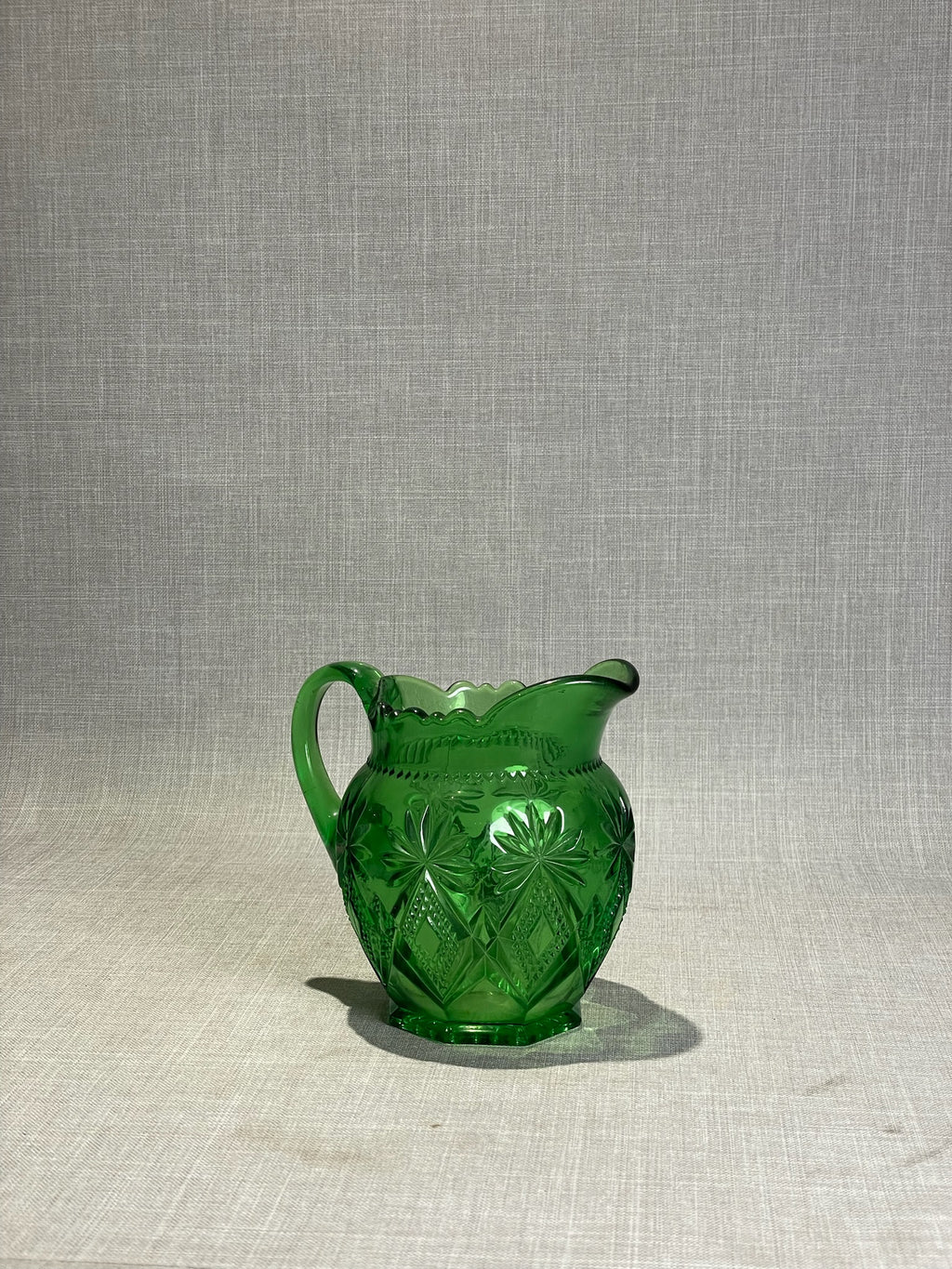 Vintage Shoshone Emerald Green Pressed Glass Creamer with Starburst Pattern