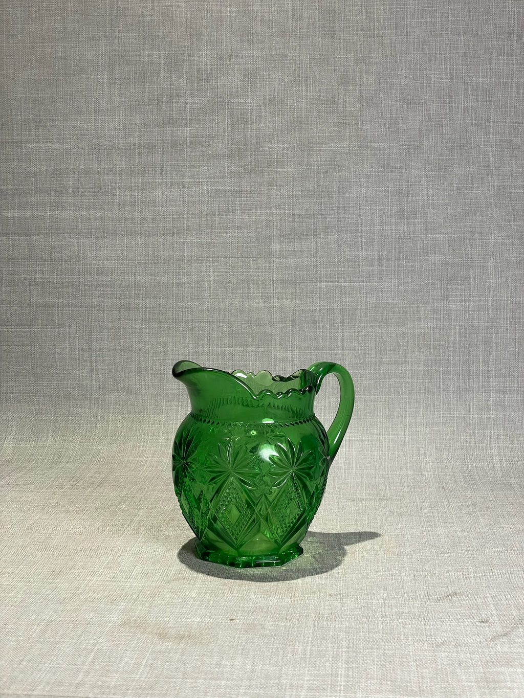 Vintage Shoshone Emerald Green Pressed Glass Creamer with Starburst Pattern