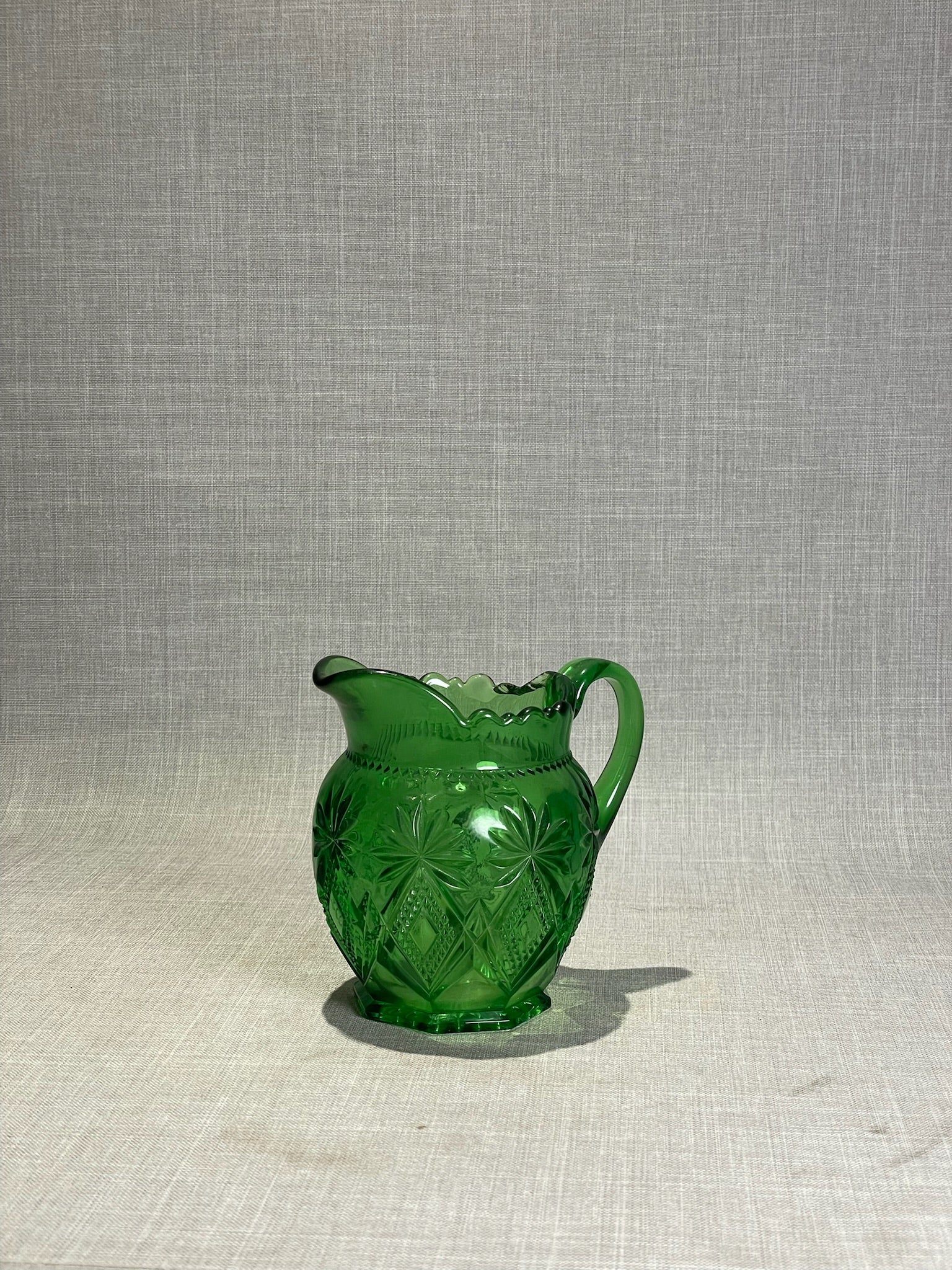 Vintage Shoshone Emerald Green Pressed Glass Creamer with Starburst Pattern