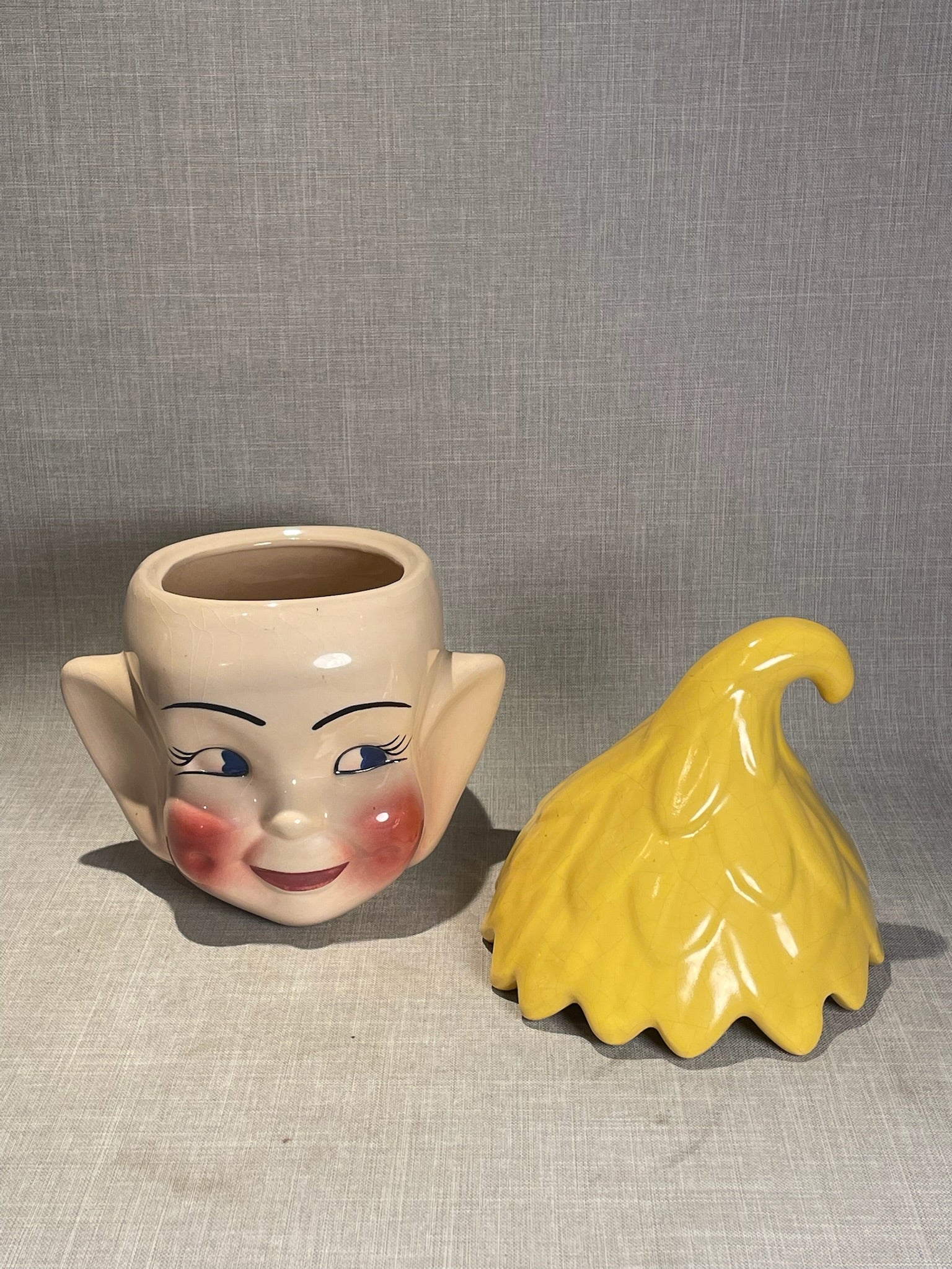 Charming Mid-Century Whimsical Pixie Elf Head Cookie Jar with Curled Yellow Cap Lid