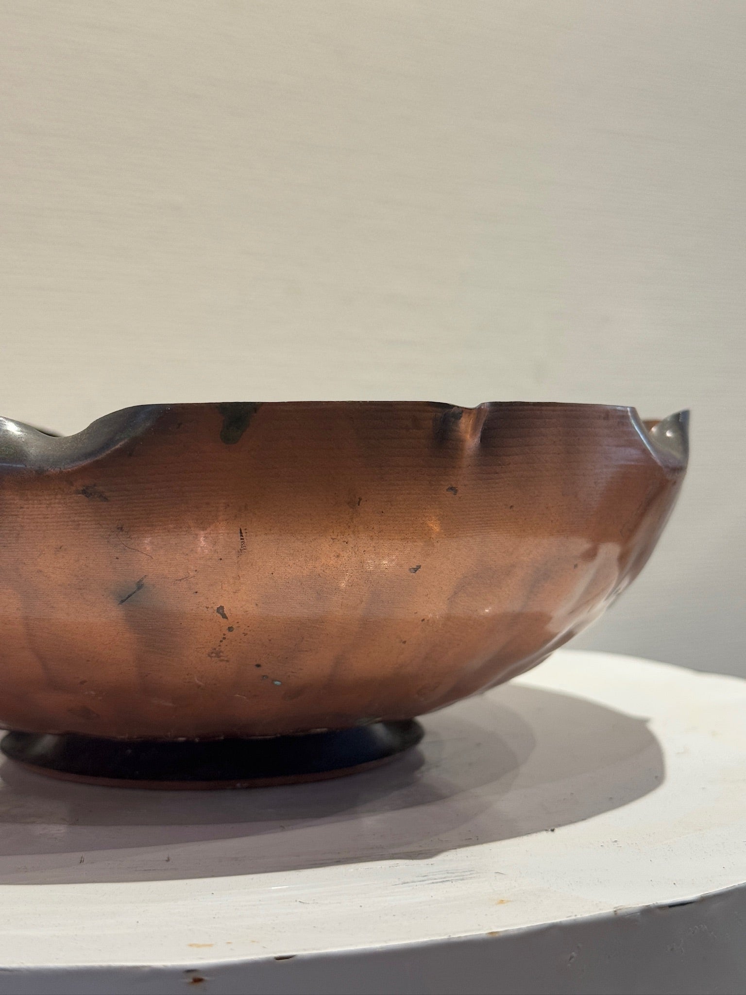 Vintage Egidio Casagrande Hand-Hammered Copper Bowl showcasing intricate hammering and a scalloped rim, hommes + gardens estudio.