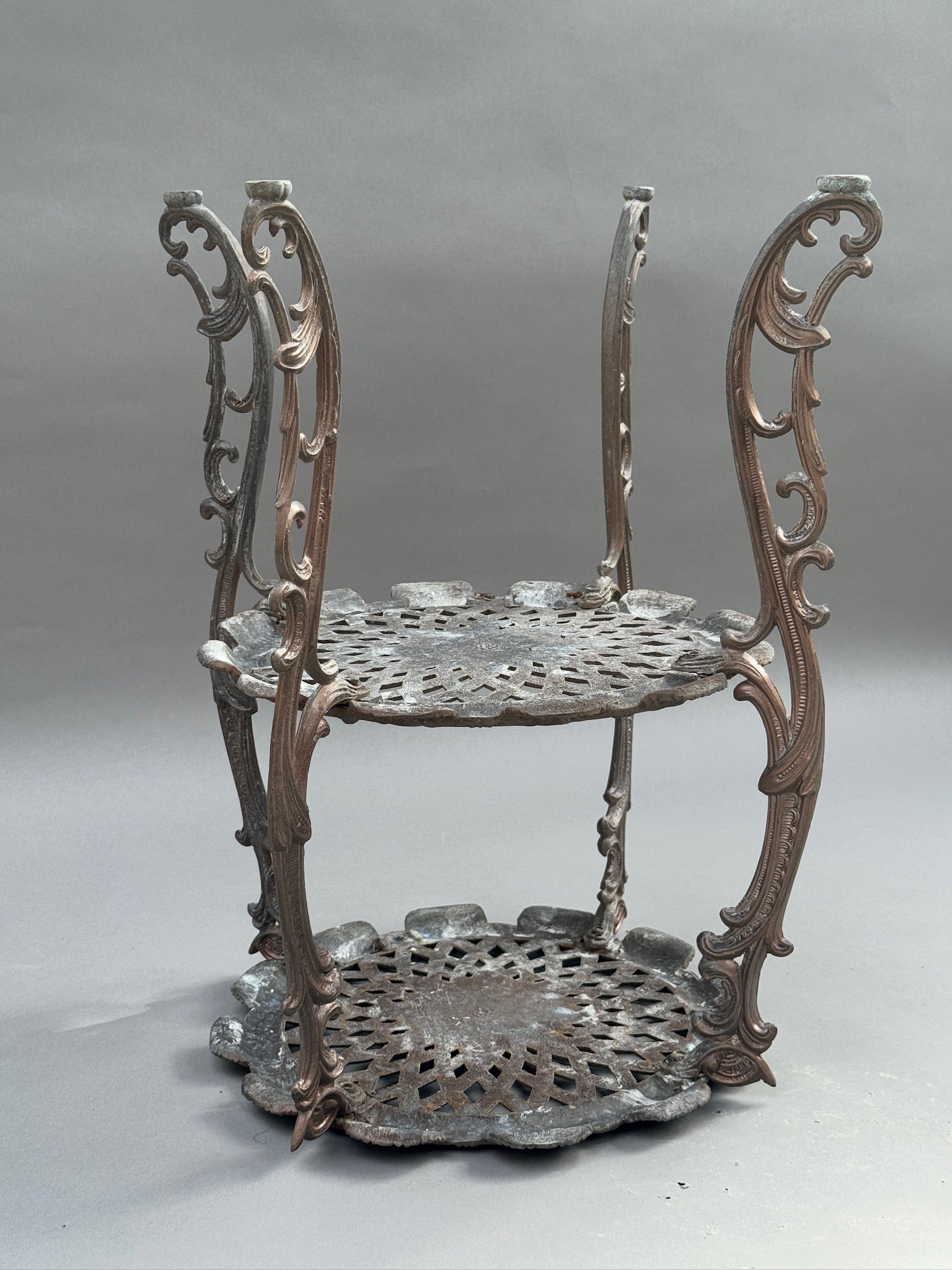 Ornate Victorian Revival Cast Iron Two-Tier Plant Stand with Pierced Floral Design - elegant garden decor by hommes + gardens estudio.