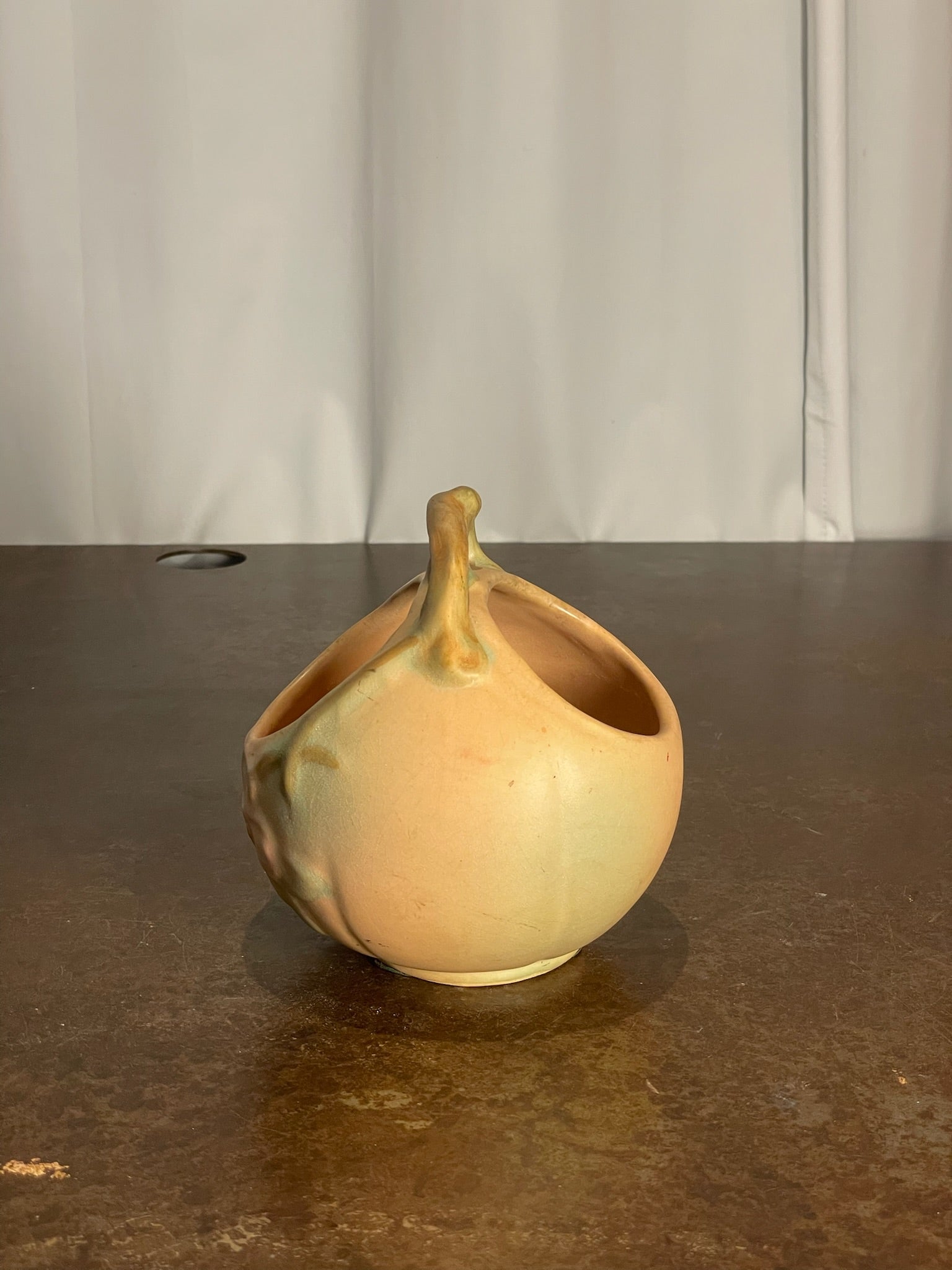 Weller Pottery Ceramic Glazed Sphere Vessel with Openwork Handle and Floral Motif