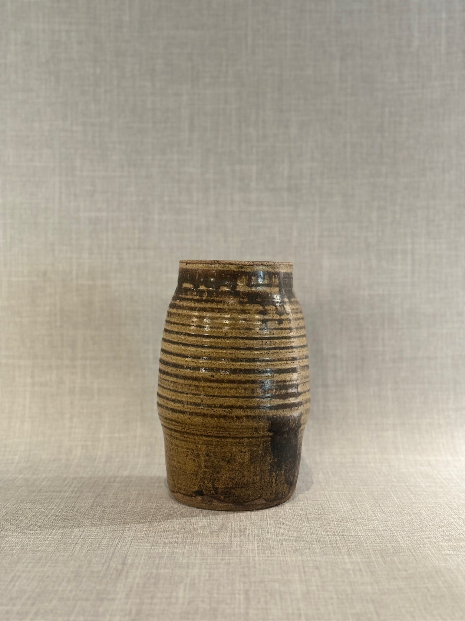 Hand-Thrown Rustic Studio Pottery Vase with Earthy Brown Glaze and Ribbed Barrel Form