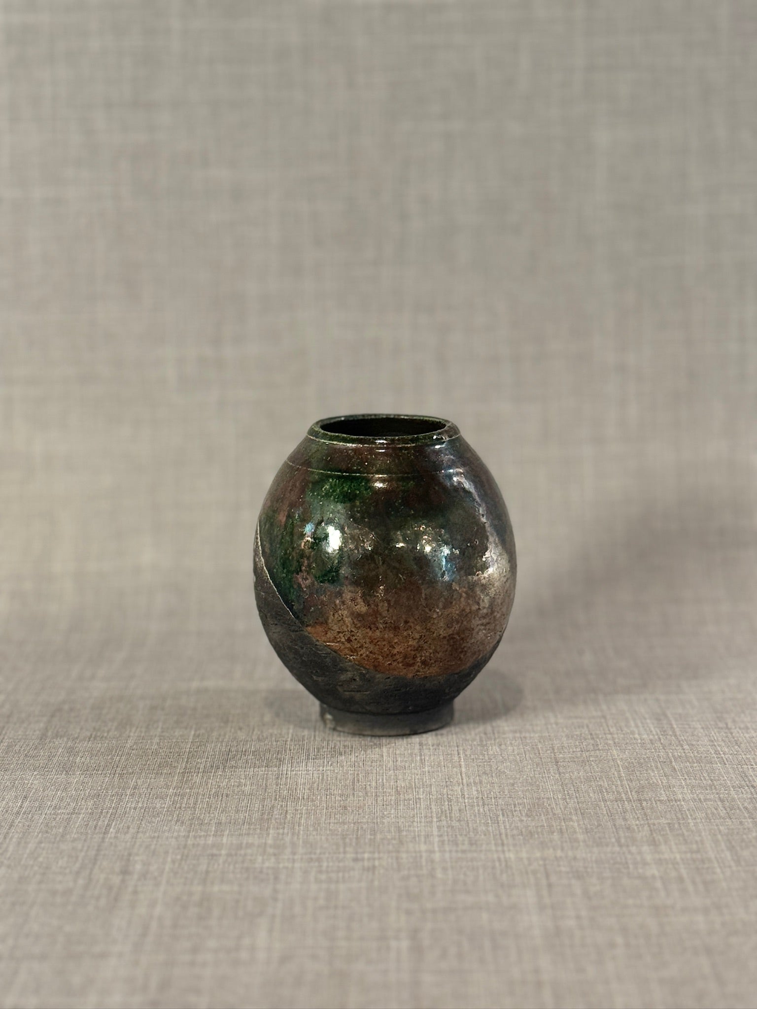 Handcrafted Raku Pottery Vase with Iridescent Metallic Glaze and Earthy Abstract Design, Signed Studio Art Piece
