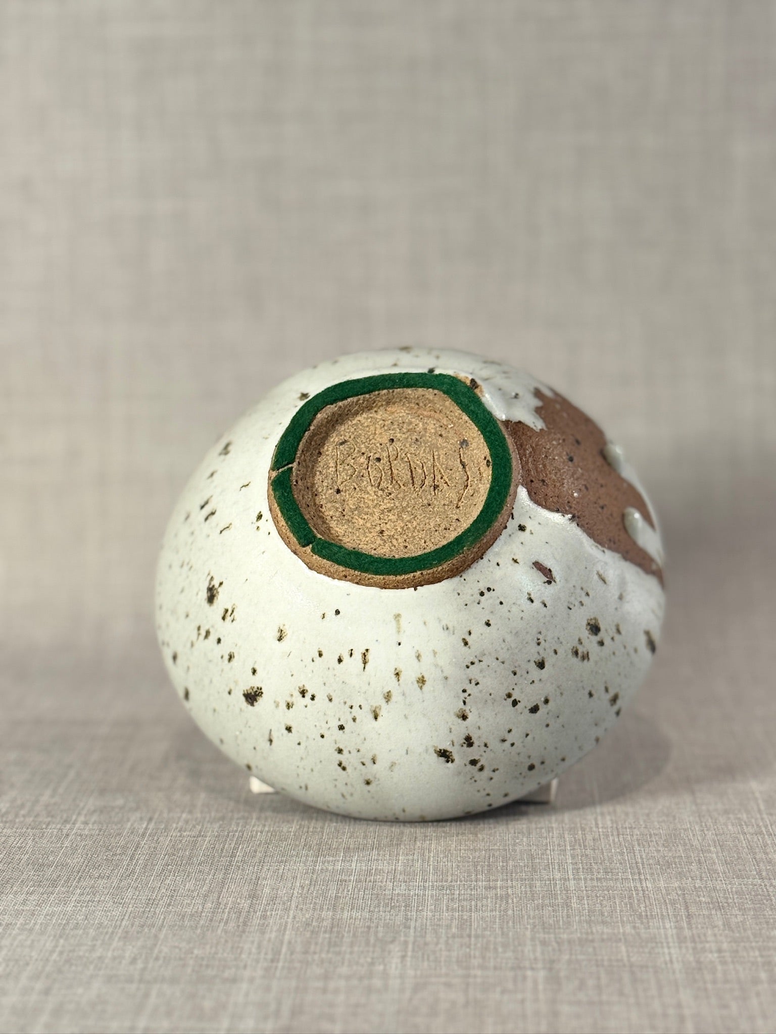 Signed Studio Art Pottery Stoneware Bowl with White Drip Glaze and Speckled Surface