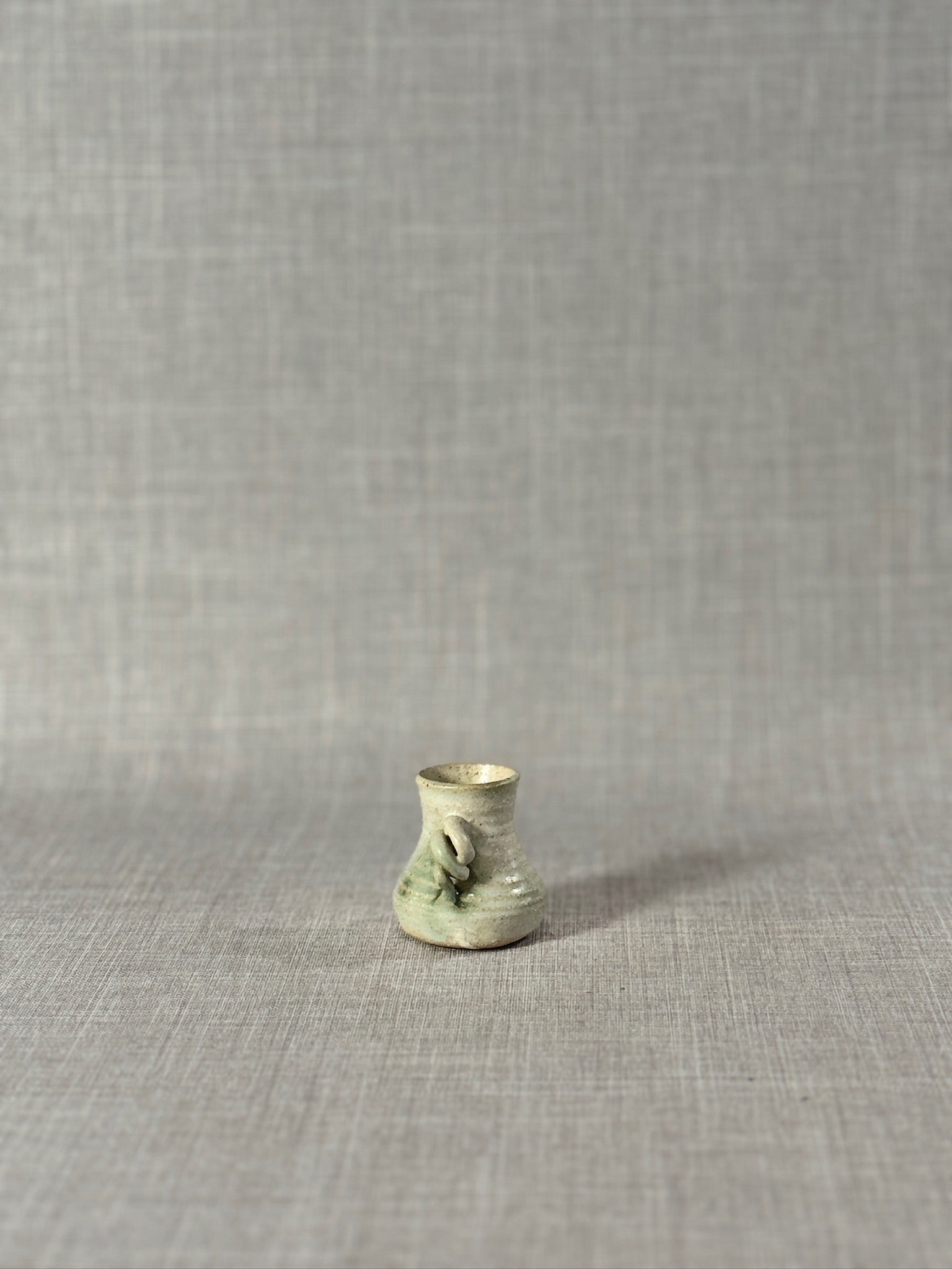 Signed Miniature Studio Pottery Jug – Hand-Thrown Celadon Green Stoneware Vessel with Sculptural Handle