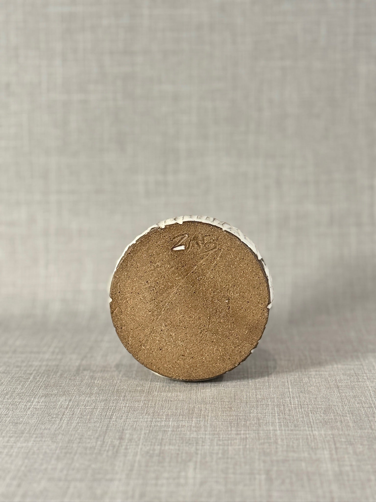 Textured Studio Pottery Bowl with Cream Glaze and Exposed Stoneware Rim