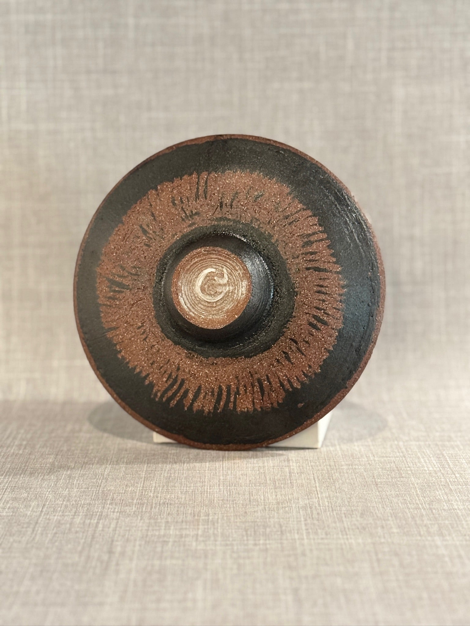 Handcrafted Mid-Century Studio Pottery Footed Bowl with Deep Tenmoku Glaze and Organic Form