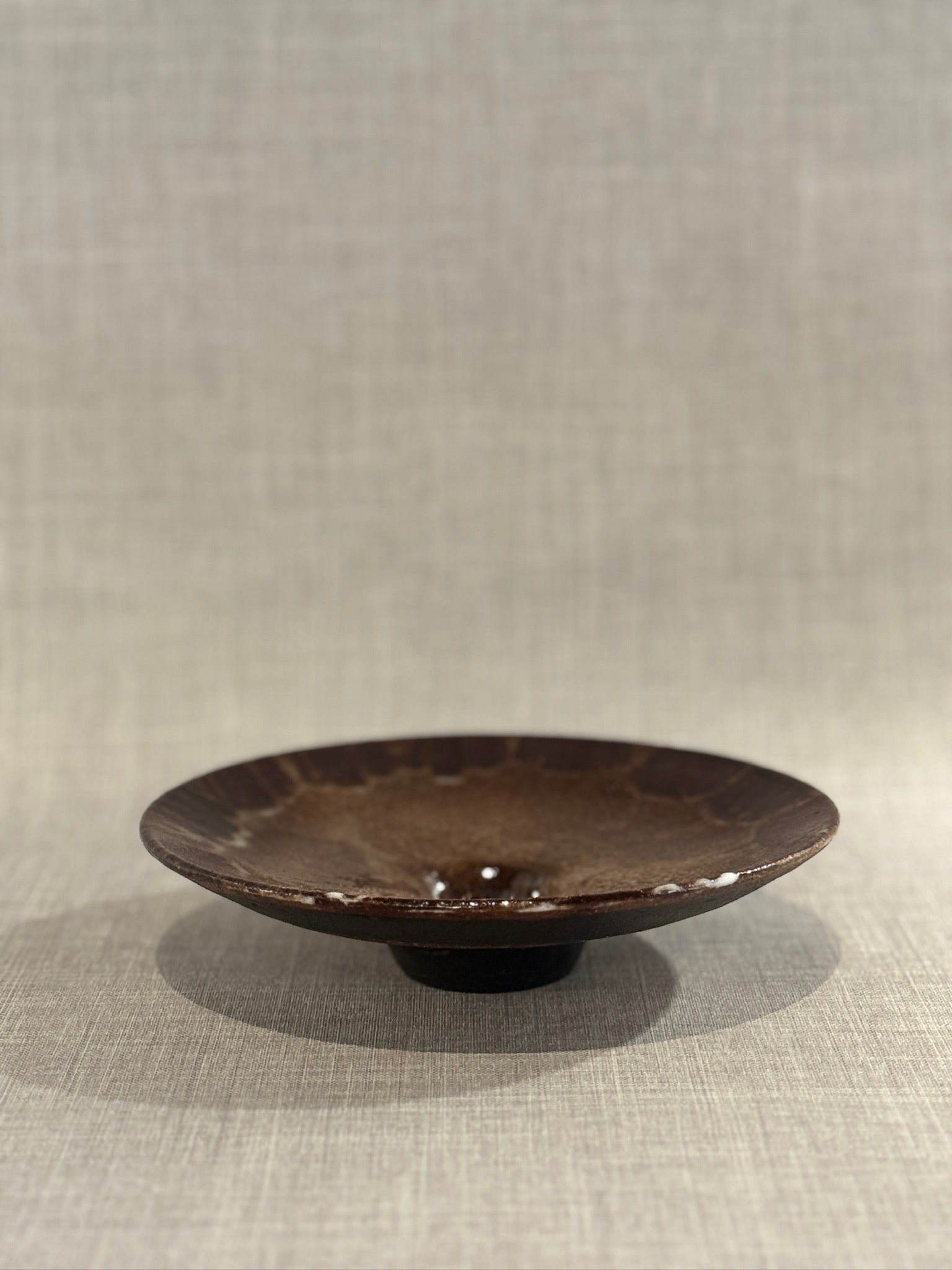 Handcrafted Mid-Century Studio Pottery Footed Bowl with Deep Tenmoku Glaze and Organic Form